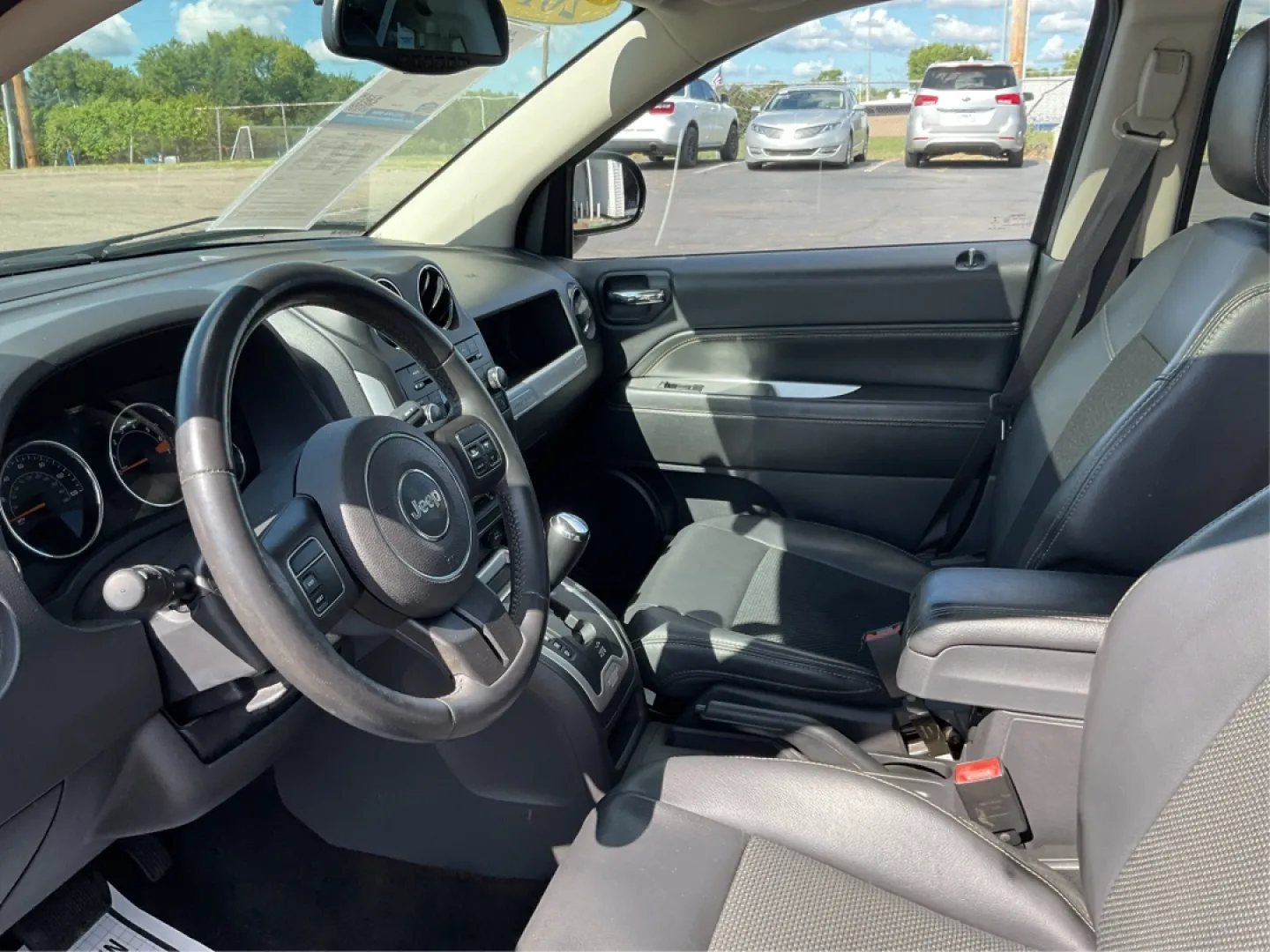2014 Jeep Compass Latitude 4WD (1C4NJDEB8ED) with an 2.4L L4 DOHC 16V engine, Continuously Variable Transmission transmission, located at 880 E. National Road, Vandalia, OH, 45377, (937) 908-9800, 39.891918, -84.183594 - **Unleash Your Adventurous Spirit with the 2014 Jeep Compass Latitude 4WD!** <br /> <br /> Are you ready to elevate your weekend getaways or daily commutes? Look no further than the stunning 2014 Jeep Compass Latitude 4WD available at Advantage Car and Credit in Vandalia, OH! This rugged yet stylish - Photo#9