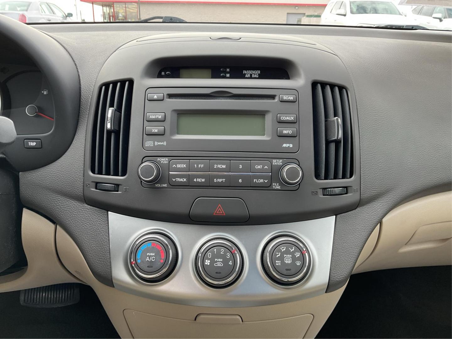 2010 Hyundai Elantra GLS (KMHDU4AD5AU) with an 2L I-4 DOHC engine, located at 1184 Kauffman Ave, Fairborn, OH, 45324, (937) 908-9800, 39.807072, -84.030914 - 2010 Hyundai Elantra GLS - Photo#12