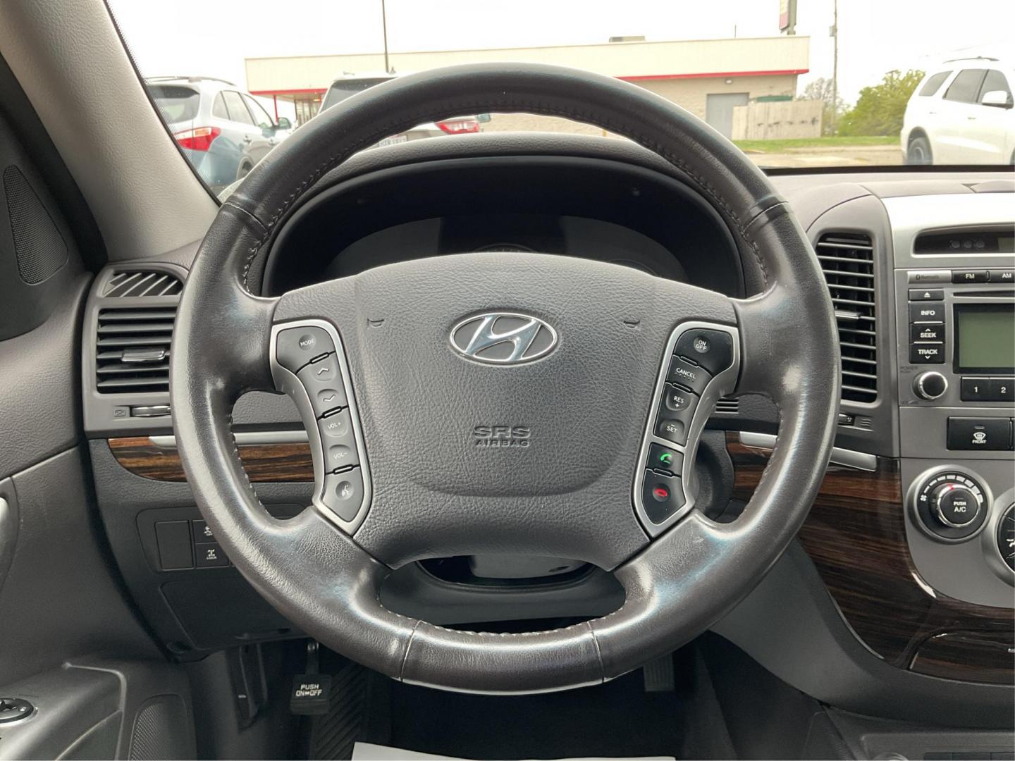 2011 Hyundai Santa Fe SE (5XYZHDAG5BG) with an 3.5L V-6 DOHC engine, located at 401 Woodman Dr, Riverside, OH, 45431, (937) 908-9800, 39.760899, -84.123421 - 2011 Hyundai Santa Fe SE - Photo#15