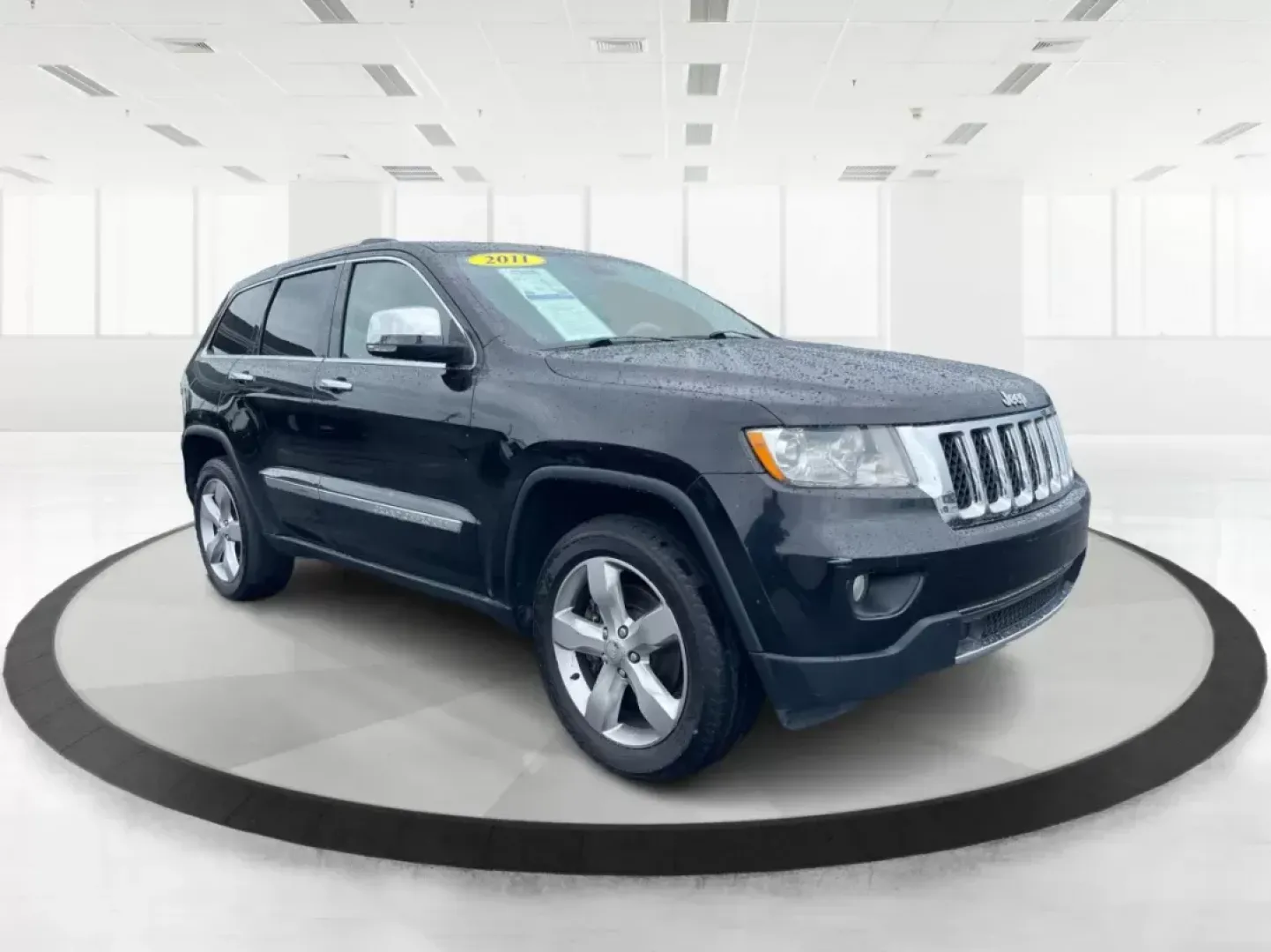 2011 Jeep Grand Cherokee Overland (1J4RR6GT7BC) with an Other engine, located at 8750 N County Rd 25A, Piqua, OH, 45356, (937) 908-9800, 40.164391, -84.232513 - **Elevate Your Adventures with the 2011 Jeep Grand Cherokee Overland at Advantage Car and Credit!**<br /> <br /> Are you ready to take your family on unforgettable weekend getaways while having the peace of mind that comes with a dependable vehicle? Look no further than this stunning 2011 Jeep Grand - Photo#0