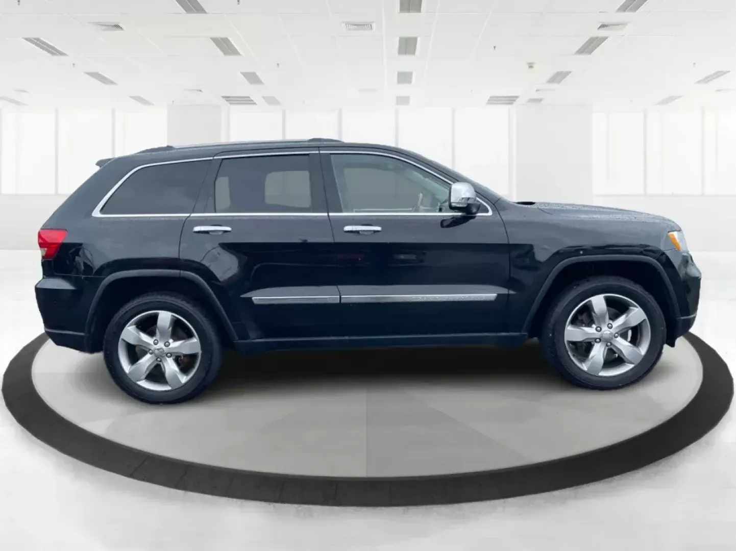 2011 Jeep Grand Cherokee Overland (1J4RR6GT7BC) with an Other engine, located at 8750 N County Rd 25A, Piqua, OH, 45356, (937) 908-9800, 40.164391, -84.232513 - **Elevate Your Adventures with the 2011 Jeep Grand Cherokee Overland at Advantage Car and Credit!**<br /> <br /> Are you ready to take your family on unforgettable weekend getaways while having the peace of mind that comes with a dependable vehicle? Look no further than this stunning 2011 Jeep Grand - Photo#1