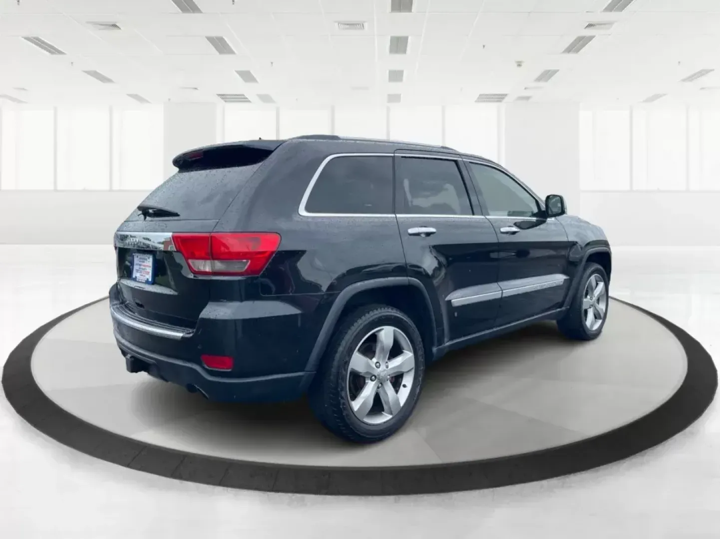 2011 Jeep Grand Cherokee Overland (1J4RR6GT7BC) with an Other engine, located at 8750 N County Rd 25A, Piqua, OH, 45356, (937) 908-9800, 40.164391, -84.232513 - **Elevate Your Adventures with the 2011 Jeep Grand Cherokee Overland at Advantage Car and Credit!**<br /> <br /> Are you ready to take your family on unforgettable weekend getaways while having the peace of mind that comes with a dependable vehicle? Look no further than this stunning 2011 Jeep Grand - Photo#2