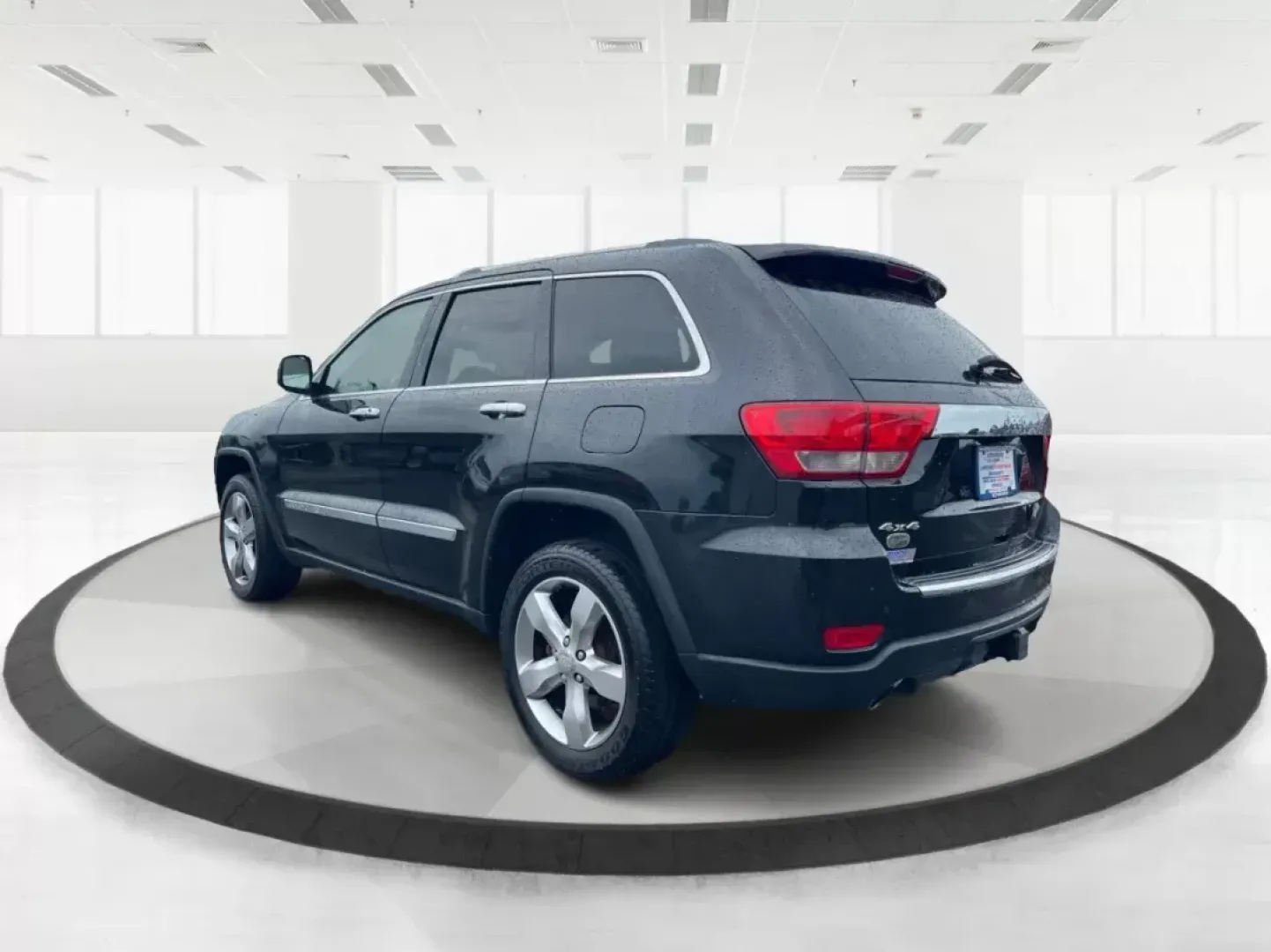2011 Jeep Grand Cherokee Overland (1J4RR6GT7BC) with an Other engine, located at 8750 N County Rd 25A, Piqua, OH, 45356, (937) 908-9800, 40.164391, -84.232513 - **Elevate Your Adventures with the 2011 Jeep Grand Cherokee Overland at Advantage Car and Credit!**<br /> <br /> Are you ready to take your family on unforgettable weekend getaways while having the peace of mind that comes with a dependable vehicle? Look no further than this stunning 2011 Jeep Grand - Photo#4