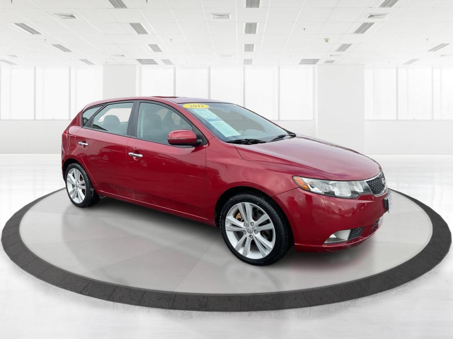 2011 Spicy Red Metallic Kia Forte 5-Door SX (KNAFW5A33B5) with an 2.4L L4 DOHC 16V engine, located at 1230 East Main St, Xenia, OH, 45385, (937) 908-9800, 39.688026, -83.910172 - 2011 Kia Forte 5-Door SX - Photo#0