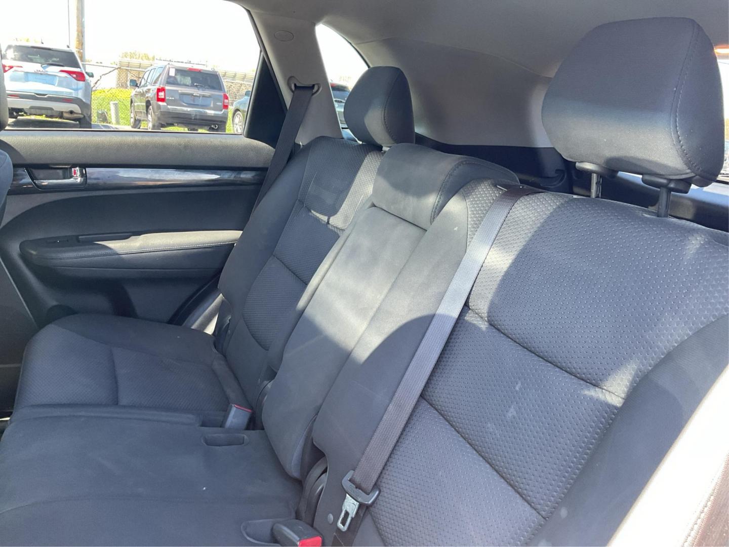 2011 Dark Cherry Kia Sorento LX 2WD (5XYKT3A14BG) with an 2.4L L4 DOHC 16V engine, 6-Speed Automatic transmission, located at 1184 Kauffman Ave, Fairborn, OH, 45324, (937) 908-9800, 39.807072, -84.030914 - 2011 Kia Sorento LX 2WD - Photo#9