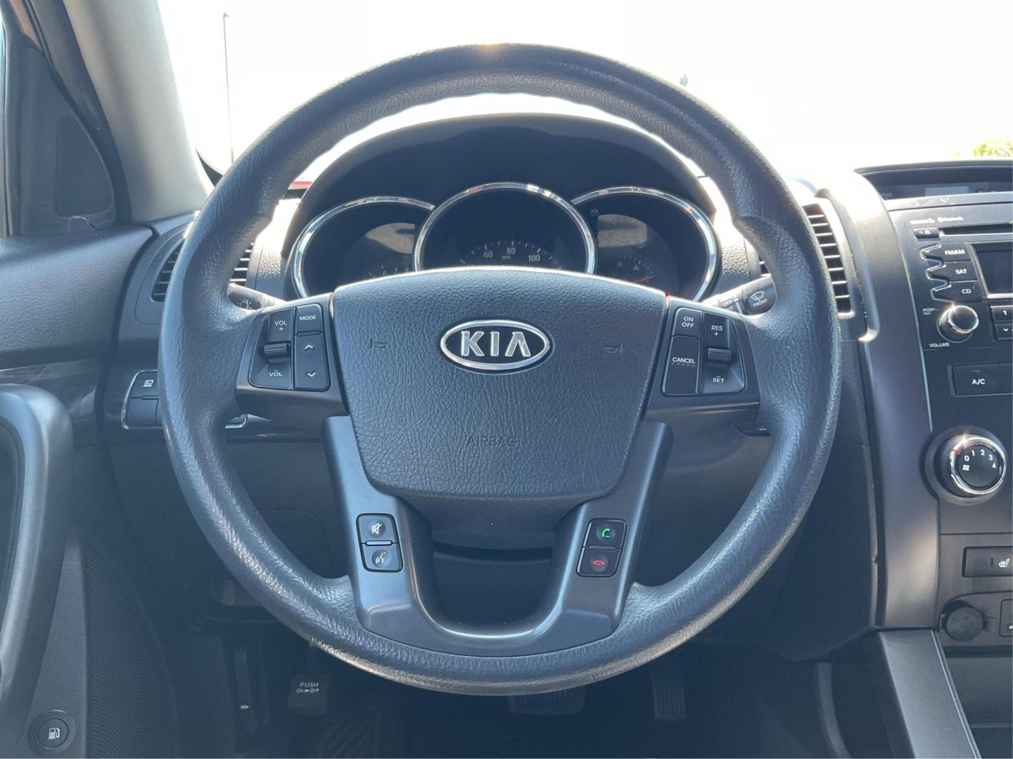 2011 Dark Cherry Kia Sorento LX 2WD (5XYKT3A14BG) with an 2.4L L4 DOHC 16V engine, 6-Speed Automatic transmission, located at 1184 Kauffman Ave, Fairborn, OH, 45324, (937) 908-9800, 39.807072, -84.030914 - 2011 Kia Sorento LX 2WD - Photo#14