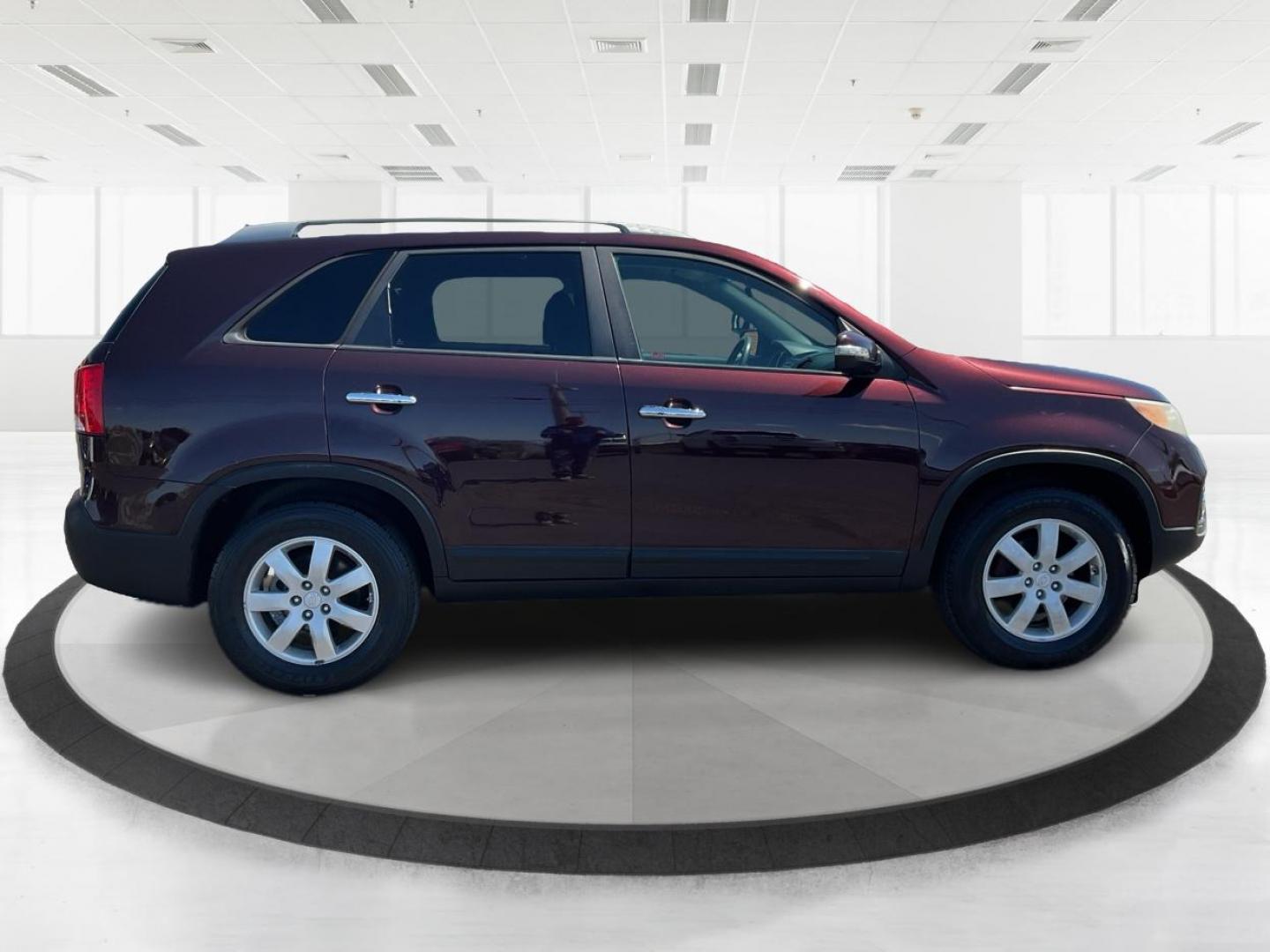 2011 Dark Cherry Kia Sorento LX 2WD (5XYKT3A14BG) with an 2.4L L4 DOHC 16V engine, 6-Speed Automatic transmission, located at 1184 Kauffman Ave, Fairborn, OH, 45324, (937) 908-9800, 39.807072, -84.030914 - 2011 Kia Sorento LX 2WD - Photo#1
