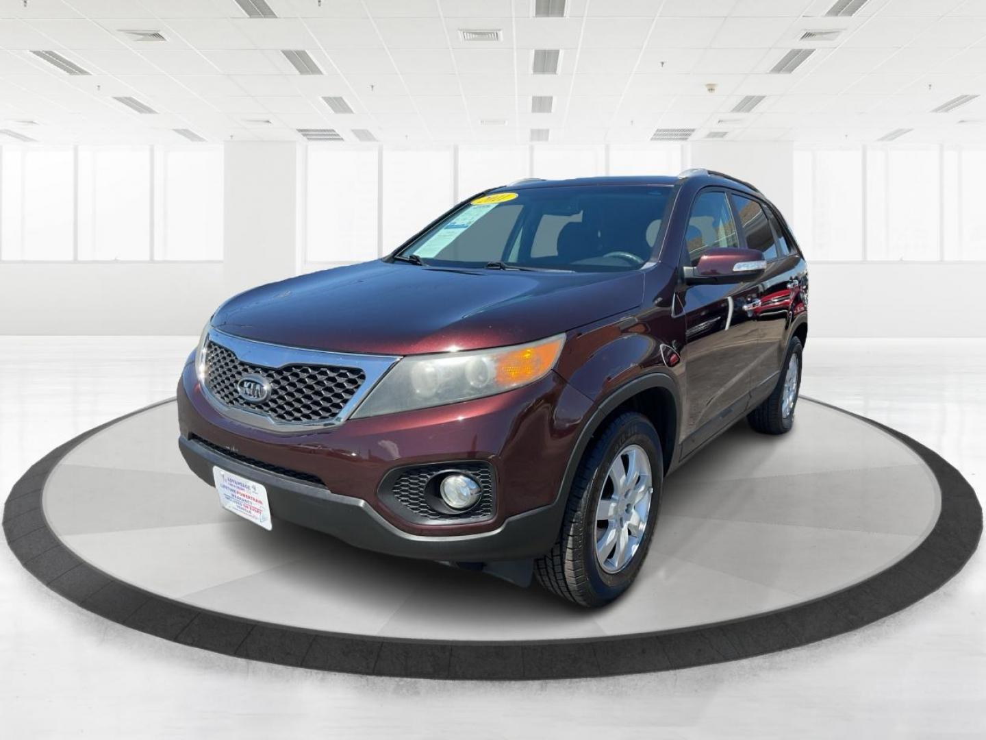 2011 Dark Cherry Kia Sorento LX 2WD (5XYKT3A14BG) with an 2.4L L4 DOHC 16V engine, 6-Speed Automatic transmission, located at 1184 Kauffman Ave, Fairborn, OH, 45324, (937) 908-9800, 39.807072, -84.030914 - 2011 Kia Sorento LX 2WD - Photo#7