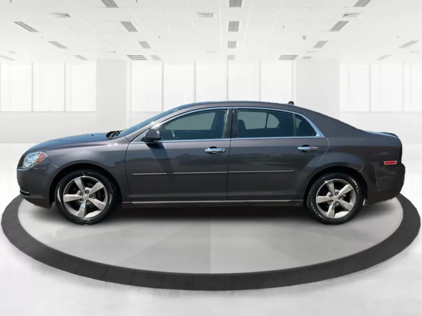 2012 Chevrolet Malibu 1LT (1G1ZC5E0XCF) with an Ecotec 2.4L I-4 DOHC engine, located at 1951 S Dayton Lakeview Rd., New Carlisle, OH, 45344, (937) 908-9800, 39.890999, -84.050255 - **Discover Your Next Adventure with This 2012 Chevrolet Malibu!** <br /> <br /> Are you searching for the perfect vehicle to elevate your daily commute or family journey? Look no further! The 2012 Chevrolet Malibu 1LT is not just a car; it's a lifestyle enhancer, designed for those who value reliabi - Photo#5