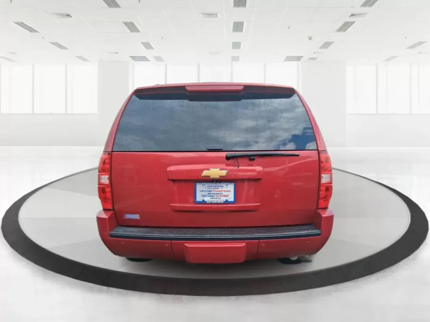 2012 Chevrolet Tahoe LTZ (1GNSKCE09CR) with an Vortec 5.3L V-8 variable valve control engine, located at 8750 N County Rd 25A, Piqua, OH, 45356, (937) 908-9800, 40.164391, -84.232513 - Experience the ultimate in family adventures with the 2012 Chevrolet Tahoe LTZ, available at Advantage Car and Credit in Fairborn, OH. This striking Crystal Red Tintcoat utility vehicle is the perfect blend of power, luxury, and versatility, making it an ideal choice for growing families and weekend - Photo#3