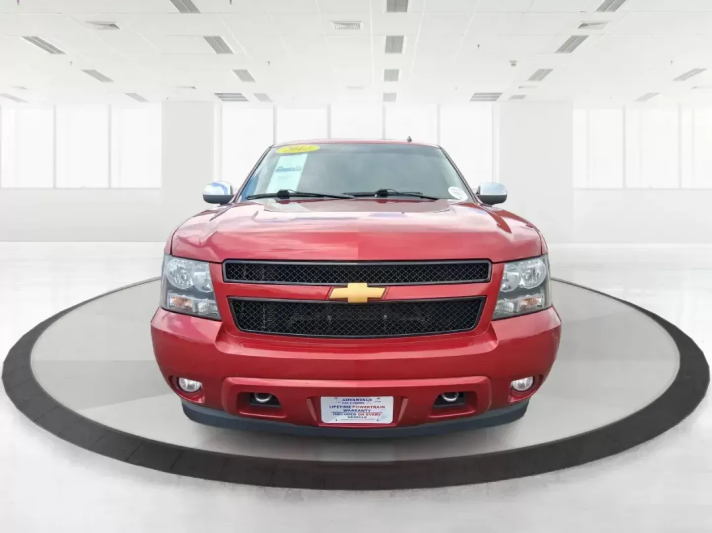 2012 Chevrolet Tahoe LTZ (1GNSKCE09CR) with an Vortec 5.3L V-8 variable valve control engine, located at 8750 N County Rd 25A, Piqua, OH, 45356, (937) 908-9800, 40.164391, -84.232513 - Experience the ultimate in family adventures with the 2012 Chevrolet Tahoe LTZ, available at Advantage Car and Credit in Fairborn, OH. This striking Crystal Red Tintcoat utility vehicle is the perfect blend of power, luxury, and versatility, making it an ideal choice for growing families and weekend - Photo#6