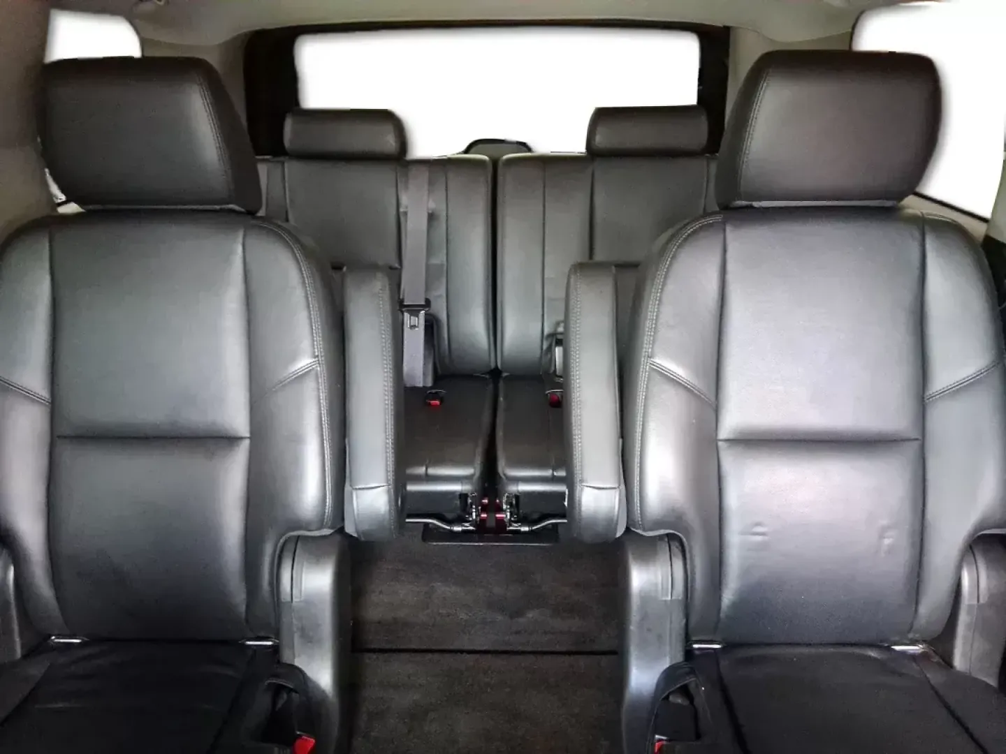 2012 Chevrolet Tahoe LTZ (1GNSKCE09CR) with an Vortec 5.3L V-8 variable valve control engine, located at 8750 N County Rd 25A, Piqua, OH, 45356, (937) 908-9800, 40.164391, -84.232513 - Experience the ultimate in family adventures with the 2012 Chevrolet Tahoe LTZ, available at Advantage Car and Credit in Fairborn, OH. This striking Crystal Red Tintcoat utility vehicle is the perfect blend of power, luxury, and versatility, making it an ideal choice for growing families and weekend - Photo#13