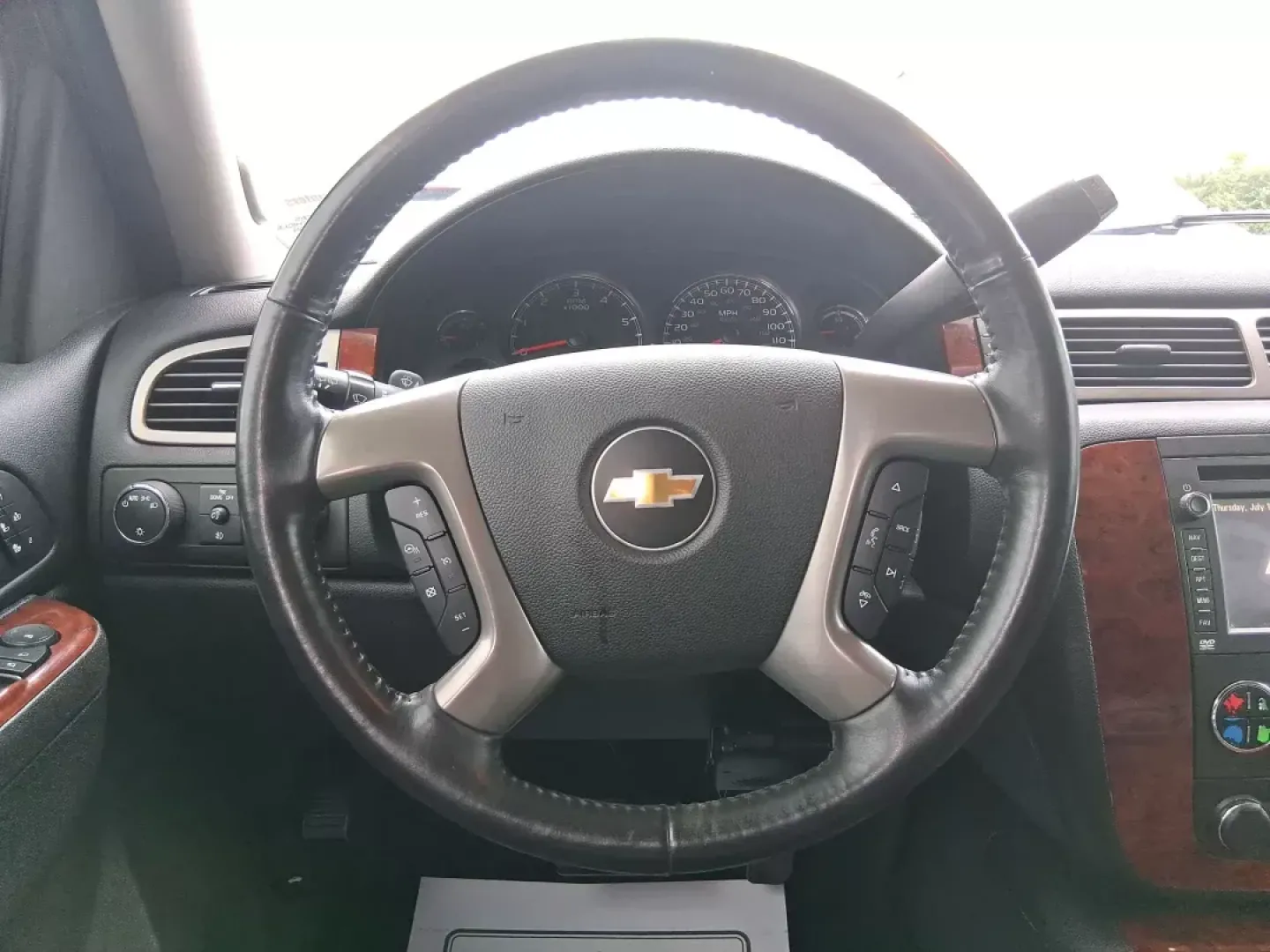 2012 Chevrolet Tahoe LTZ (1GNSKCE09CR) with an Vortec 5.3L V-8 variable valve control engine, located at 8750 N County Rd 25A, Piqua, OH, 45356, (937) 908-9800, 40.164391, -84.232513 - Experience the ultimate in family adventures with the 2012 Chevrolet Tahoe LTZ, available at Advantage Car and Credit in Fairborn, OH. This striking Crystal Red Tintcoat utility vehicle is the perfect blend of power, luxury, and versatility, making it an ideal choice for growing families and weekend - Photo#15