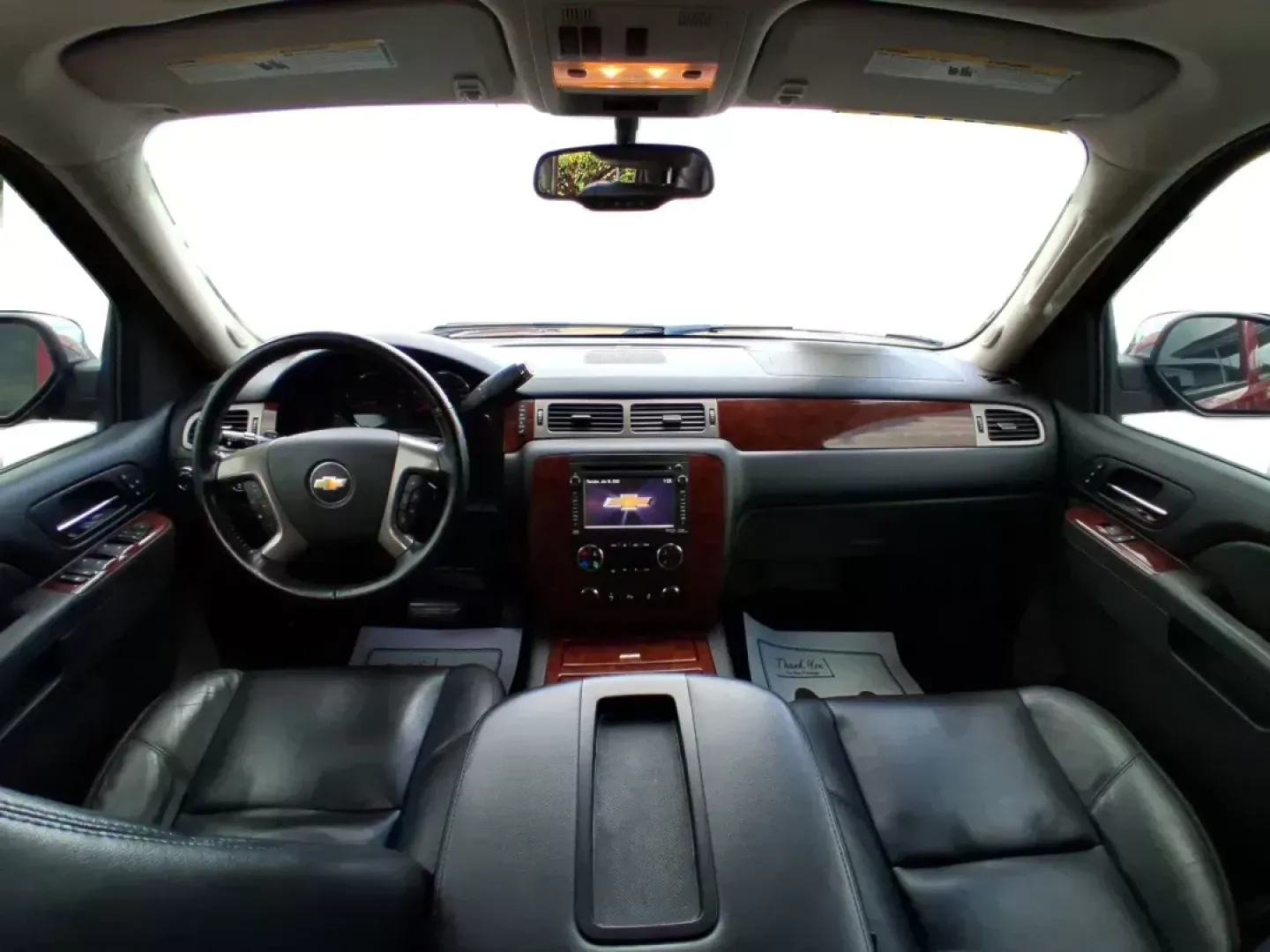 2012 Chevrolet Tahoe LTZ (1GNSKCE09CR) with an Vortec 5.3L V-8 variable valve control engine, located at 8750 N County Rd 25A, Piqua, OH, 45356, (937) 908-9800, 40.164391, -84.232513 - Experience the ultimate in family adventures with the 2012 Chevrolet Tahoe LTZ, available at Advantage Car and Credit in Fairborn, OH. This striking Crystal Red Tintcoat utility vehicle is the perfect blend of power, luxury, and versatility, making it an ideal choice for growing families and weekend - Photo#20