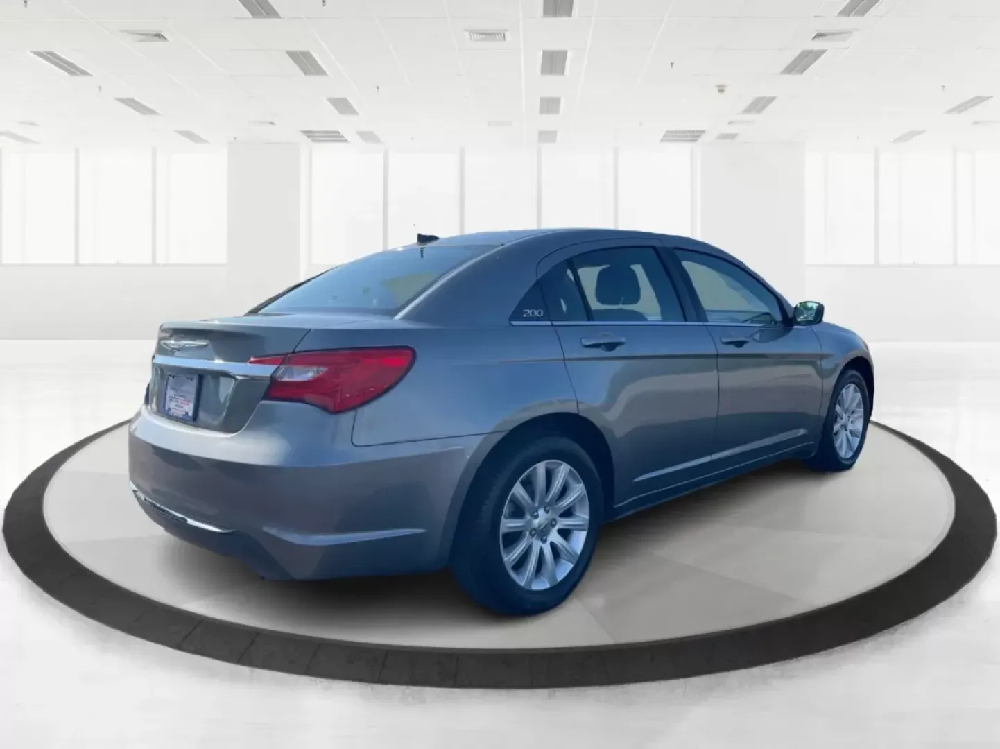 2012 Chrysler 200 Touring (1C3CCBBG5CN) with an 2.4L I-4 DOHC engine, located at 4508 South Dixie Dr, Moraine, OH, 45439, (937) 908-9800, 39.689976, -84.218452 - Are you ready to elevate your driving experience? If you're seeking a reliable vehicle that perfectly balances comfort, technology, and style, look no further than the 2012 Chrysler 200 Touring sedan. This vehicle is an ideal choice for budget-conscious buyers, growing families, and anyone who wants - Photo#2