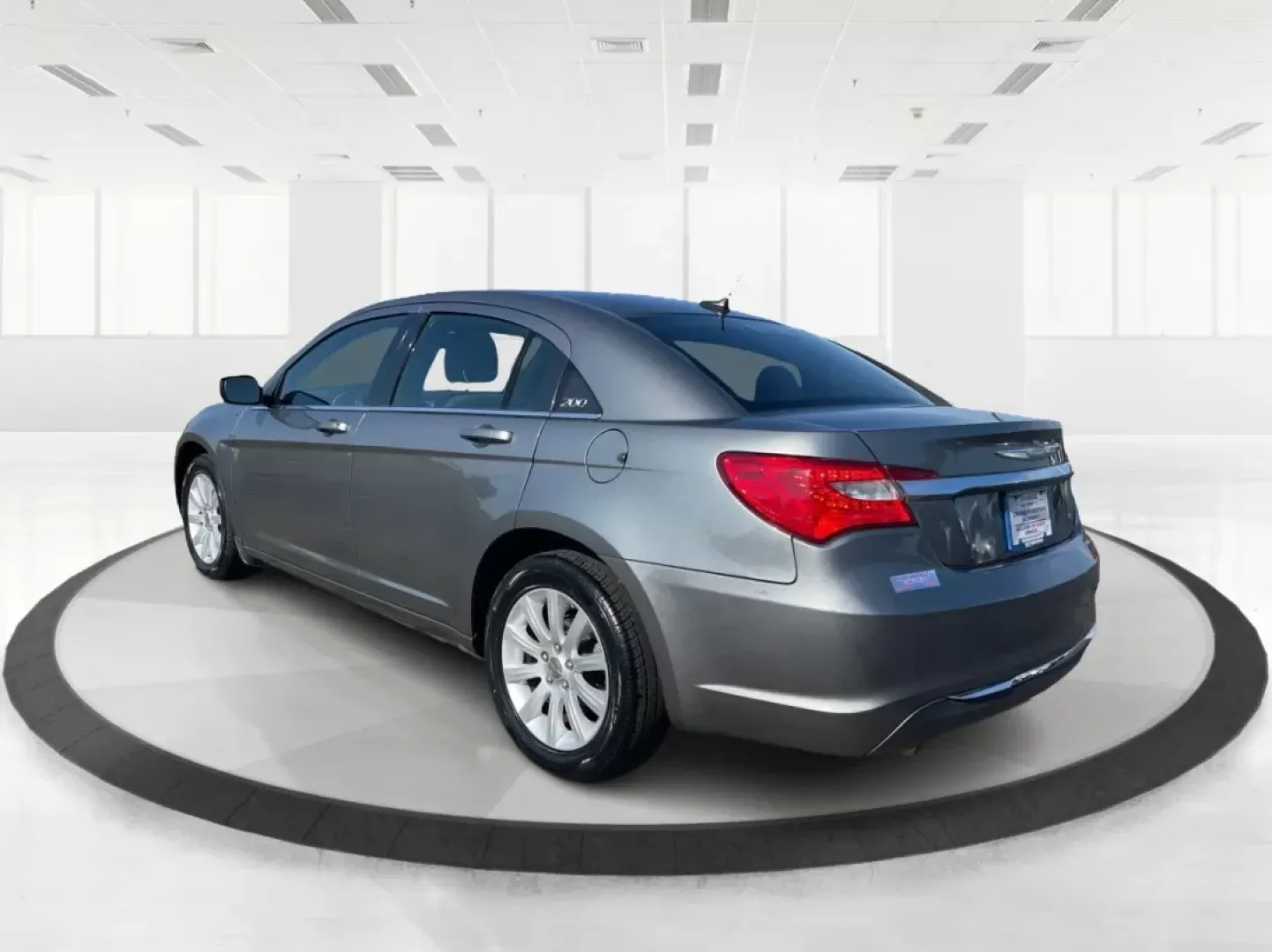 2012 Chrysler 200 Touring (1C3CCBBG5CN) with an 2.4L I-4 DOHC engine, located at 4508 South Dixie Dr, Moraine, OH, 45439, (937) 908-9800, 39.689976, -84.218452 - Are you ready to elevate your driving experience? If you're seeking a reliable vehicle that perfectly balances comfort, technology, and style, look no further than the 2012 Chrysler 200 Touring sedan. This vehicle is an ideal choice for budget-conscious buyers, growing families, and anyone who wants - Photo#4