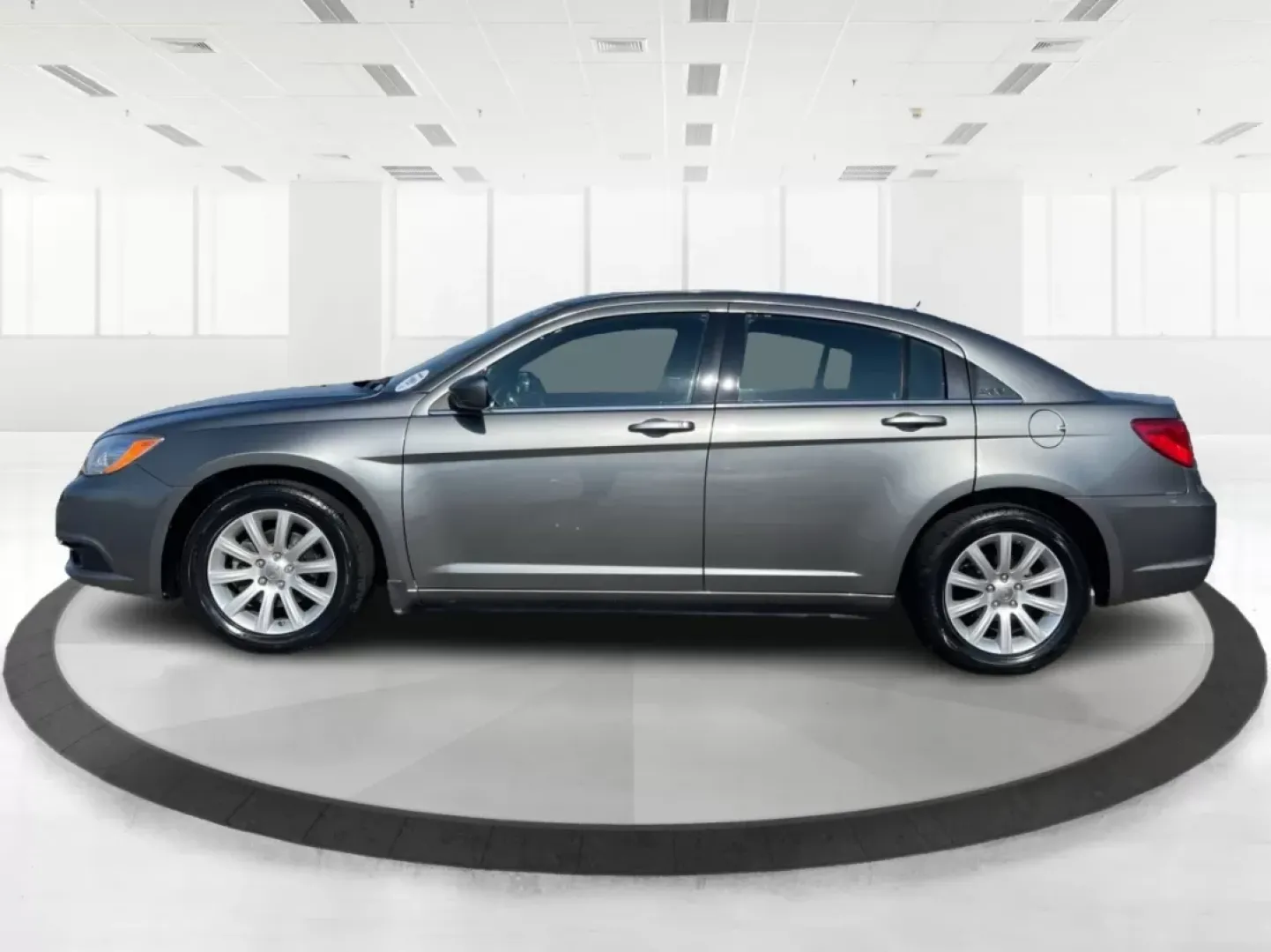2012 Chrysler 200 Touring (1C3CCBBG5CN) with an 2.4L I-4 DOHC engine, located at 4508 South Dixie Dr, Moraine, OH, 45439, (937) 908-9800, 39.689976, -84.218452 - Are you ready to elevate your driving experience? If you're seeking a reliable vehicle that perfectly balances comfort, technology, and style, look no further than the 2012 Chrysler 200 Touring sedan. This vehicle is an ideal choice for budget-conscious buyers, growing families, and anyone who wants - Photo#5