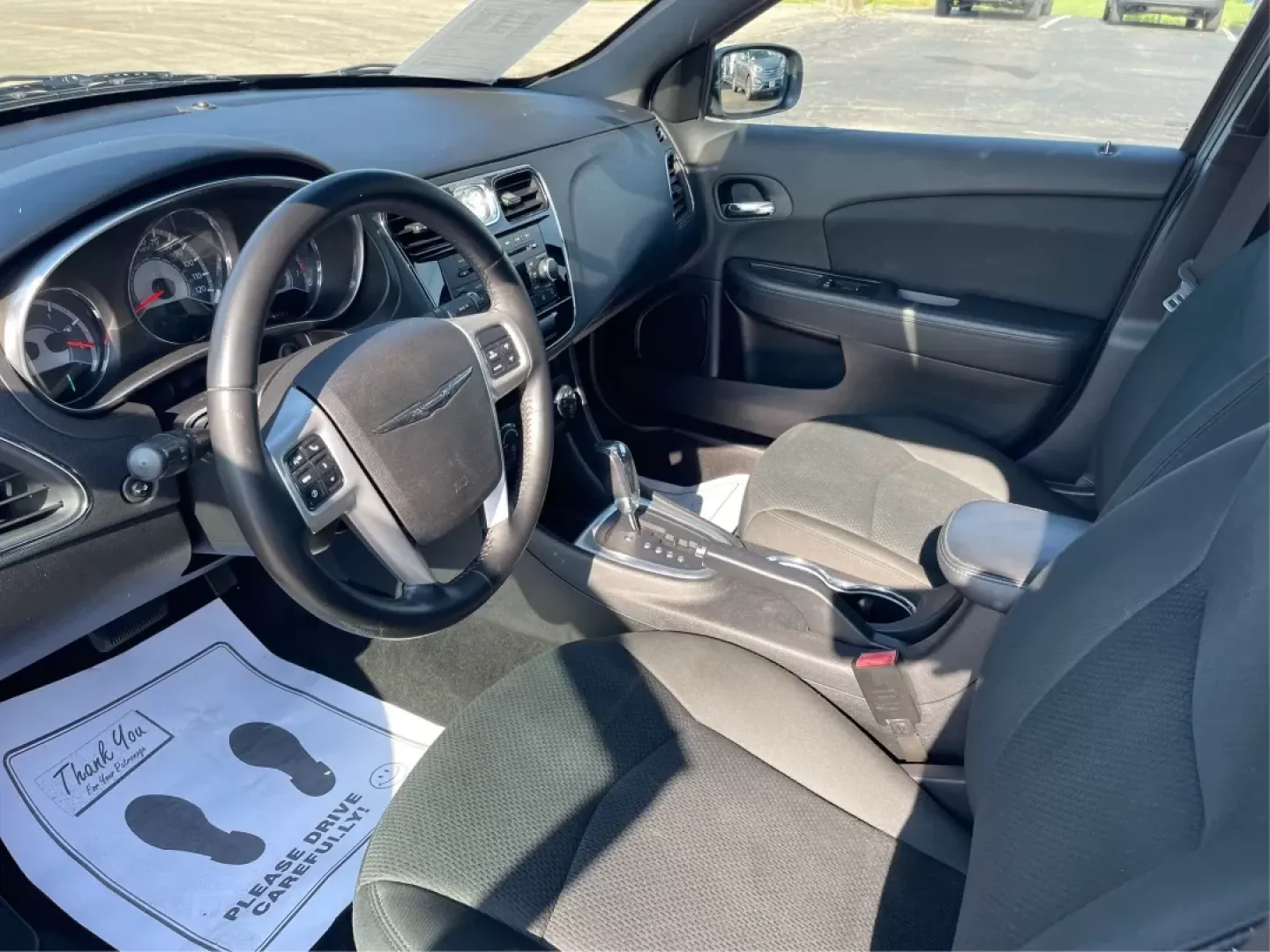 2012 Chrysler 200 Touring (1C3CCBBG5CN) with an 2.4L I-4 DOHC engine, located at 4508 South Dixie Dr, Moraine, OH, 45439, (937) 908-9800, 39.689976, -84.218452 - Are you ready to elevate your driving experience? If you're seeking a reliable vehicle that perfectly balances comfort, technology, and style, look no further than the 2012 Chrysler 200 Touring sedan. This vehicle is an ideal choice for budget-conscious buyers, growing families, and anyone who wants - Photo#9