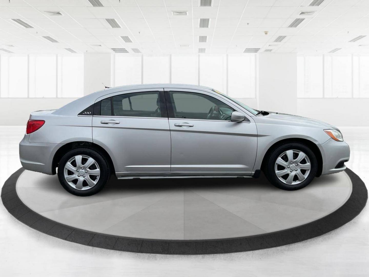 2012 Chrysler 200 LX (1C3CCBAB7CN) with an 2.4L L4 DOHC 16V engine, 6-Speed Automatic transmission, located at 1099 N County Rd 25A, Troy, OH, 45373, (937) 908-9800, 40.057079, -84.212883 - 2012 Chrysler 200 LX - Photo#1
