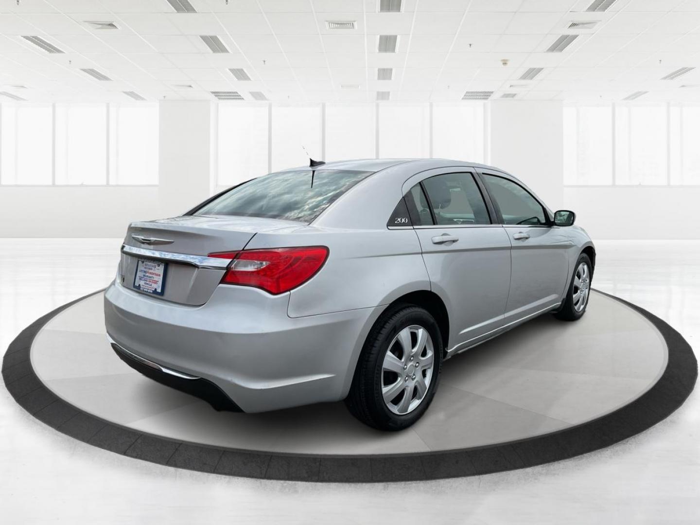 2012 Chrysler 200 LX (1C3CCBAB7CN) with an 2.4L L4 DOHC 16V engine, 6-Speed Automatic transmission, located at 1099 N County Rd 25A, Troy, OH, 45373, (937) 908-9800, 40.057079, -84.212883 - 2012 Chrysler 200 LX - Photo#2