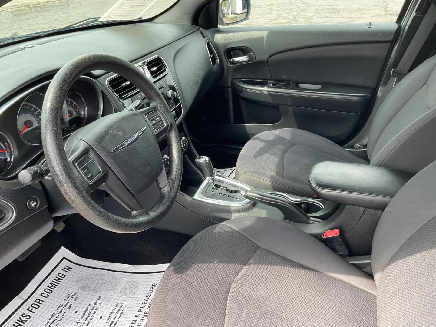 2012 Chrysler 200 LX (1C3CCBAB7CN) with an 2.4L L4 DOHC 16V engine, 6-Speed Automatic transmission, located at 1099 N County Rd 25A, Troy, OH, 45373, (937) 908-9800, 40.057079, -84.212883 - 2012 Chrysler 200 LX - Photo#9
