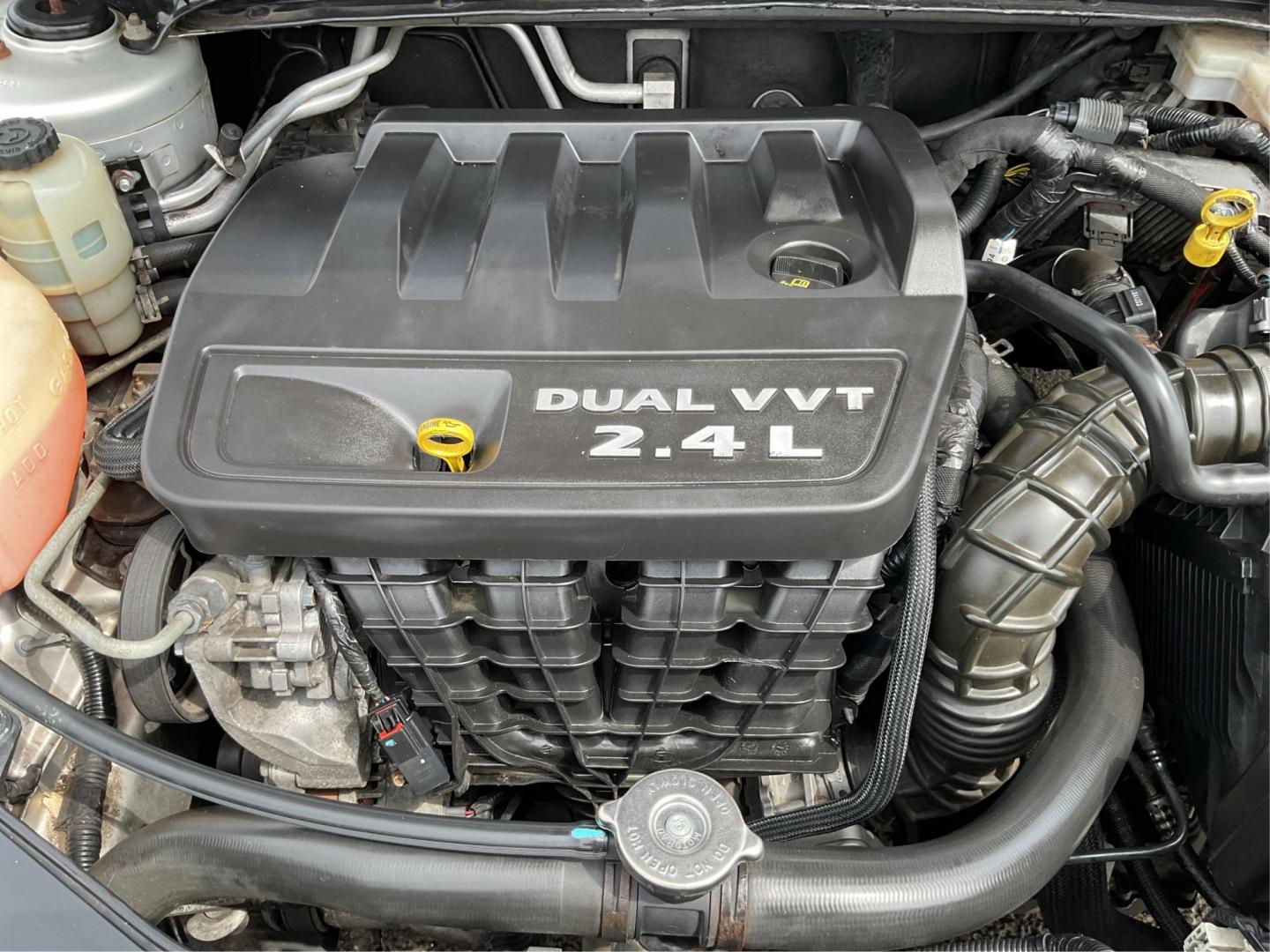 2012 Chrysler 200 LX (1C3CCBAB7CN) with an 2.4L L4 DOHC 16V engine, 6-Speed Automatic transmission, located at 1099 N County Rd 25A, Troy, OH, 45373, (937) 908-9800, 40.057079, -84.212883 - 2012 Chrysler 200 LX - Photo#11