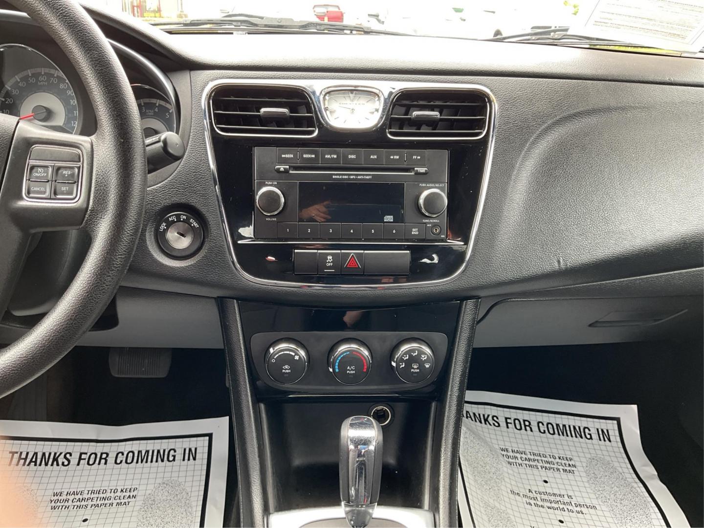 2012 Chrysler 200 LX (1C3CCBAB7CN) with an 2.4L L4 DOHC 16V engine, 6-Speed Automatic transmission, located at 1099 N County Rd 25A, Troy, OH, 45373, (937) 908-9800, 40.057079, -84.212883 - 2012 Chrysler 200 LX - Photo#13