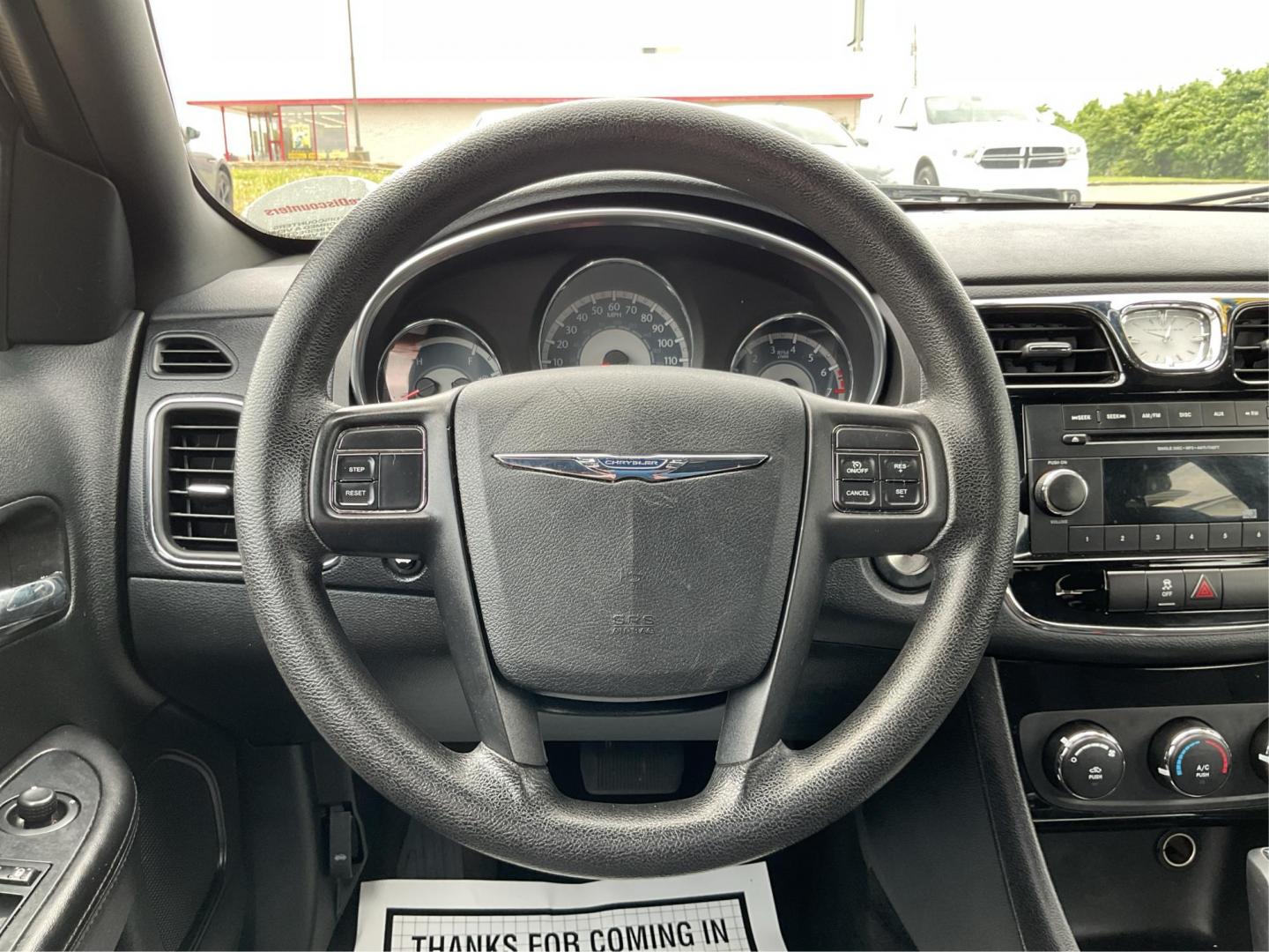 2012 Chrysler 200 LX (1C3CCBAB7CN) with an 2.4L L4 DOHC 16V engine, 6-Speed Automatic transmission, located at 1099 N County Rd 25A, Troy, OH, 45373, (937) 908-9800, 40.057079, -84.212883 - 2012 Chrysler 200 LX - Photo#16