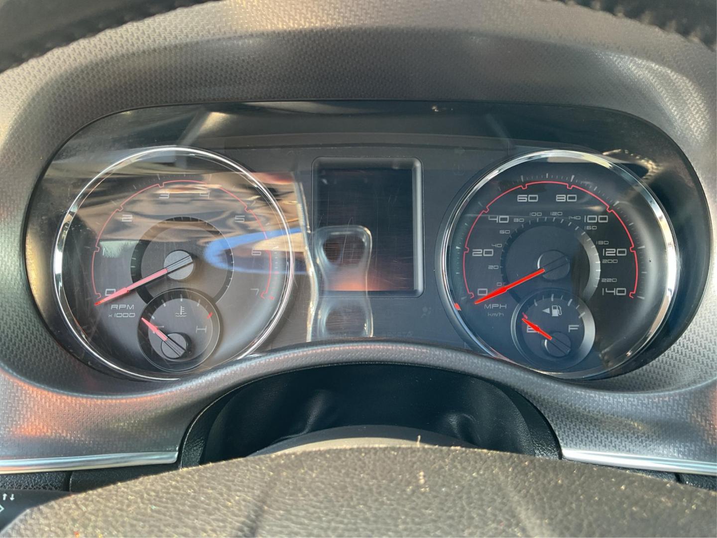 2012 Pitch Black Dodge Charger SE (2C3CDXBGXCH) with an 3.6L V6 DOHC 24V engine, 5-Speed Automatic transmission, located at 401 Woodman Dr, Riverside, OH, 45431, (937) 908-9800, 39.760899, -84.123421 - 2012 Dodge Charger SE - Photo#14