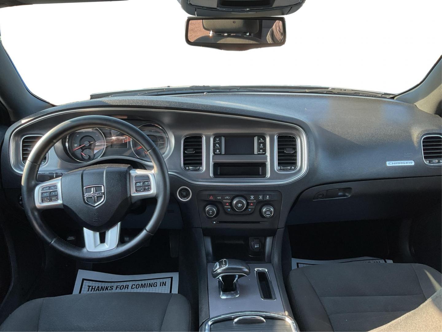 2012 Pitch Black Dodge Charger SE (2C3CDXBGXCH) with an 3.6L V6 DOHC 24V engine, 5-Speed Automatic transmission, located at 401 Woodman Dr, Riverside, OH, 45431, (937) 908-9800, 39.760899, -84.123421 - 2012 Dodge Charger SE - Photo#19
