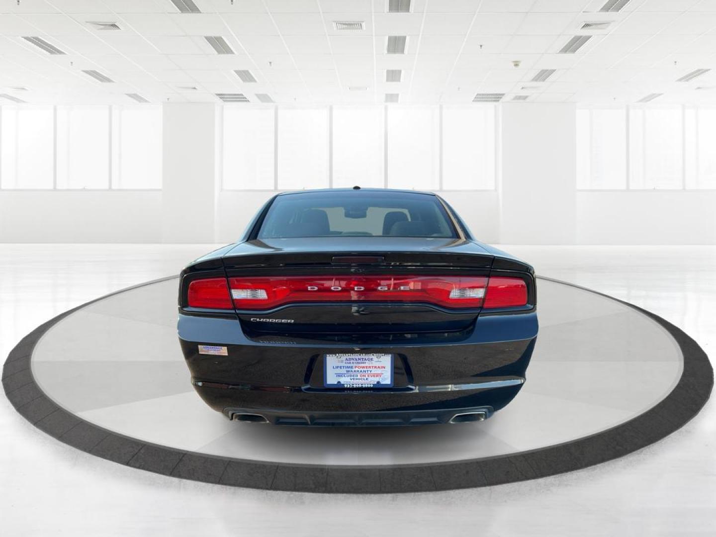 2012 Pitch Black Dodge Charger SE (2C3CDXBGXCH) with an 3.6L V6 DOHC 24V engine, 5-Speed Automatic transmission, located at 401 Woodman Dr, Riverside, OH, 45431, (937) 908-9800, 39.760899, -84.123421 - 2012 Dodge Charger SE - Photo#3