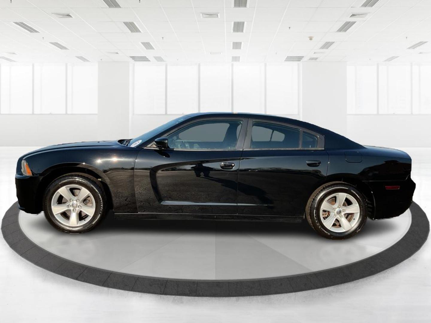 2012 Pitch Black Dodge Charger SE (2C3CDXBGXCH) with an 3.6L V6 DOHC 24V engine, 5-Speed Automatic transmission, located at 401 Woodman Dr, Riverside, OH, 45431, (937) 908-9800, 39.760899, -84.123421 - 2012 Dodge Charger SE - Photo#5