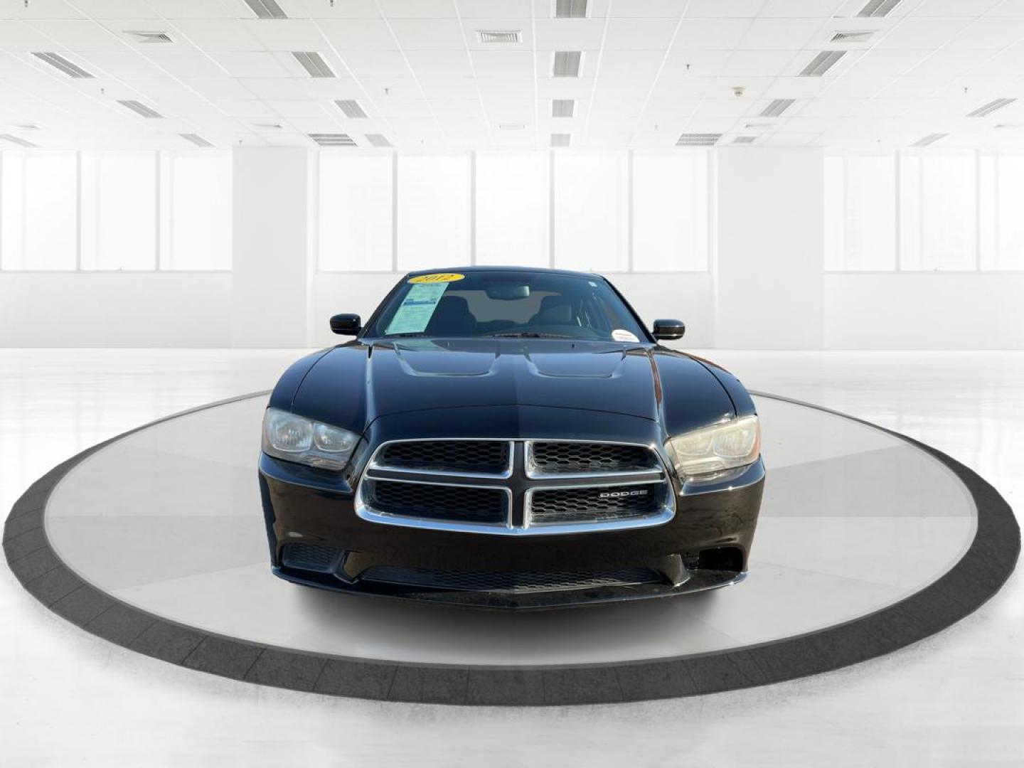 2012 Pitch Black Dodge Charger SE (2C3CDXBGXCH) with an 3.6L V6 DOHC 24V engine, 5-Speed Automatic transmission, located at 401 Woodman Dr, Riverside, OH, 45431, (937) 908-9800, 39.760899, -84.123421 - 2012 Dodge Charger SE - Photo#6
