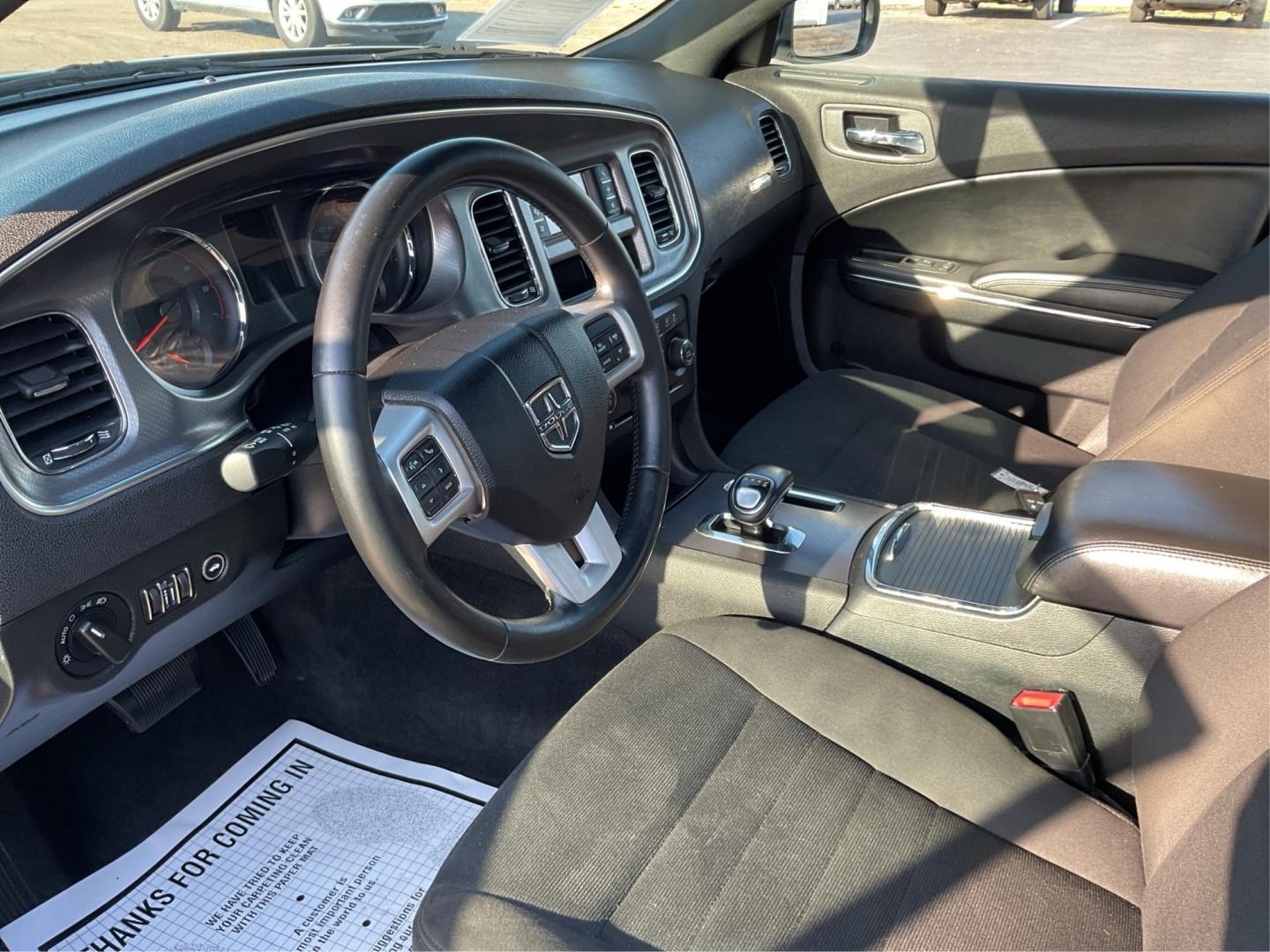 2012 Pitch Black Dodge Charger SE (2C3CDXBGXCH) with an 3.6L V6 DOHC 24V engine, 5-Speed Automatic transmission, located at 401 Woodman Dr, Riverside, OH, 45431, (937) 908-9800, 39.760899, -84.123421 - 2012 Dodge Charger SE - Photo#8