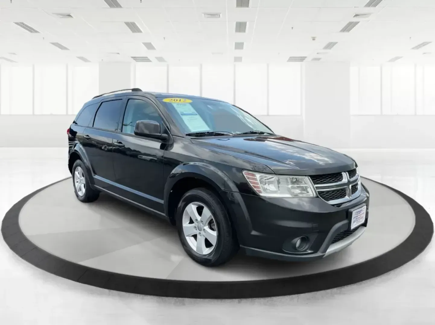 2012 Dodge Journey SXT (3C4PDCBG5CT) with an 2.4L I-4 DOHC engine, located at 401 Woodman Dr, Riverside, OH, 45431, (937) 908-9800, 39.760899, -84.123421 - 2012 Dodge Journey SXT - Photo#0