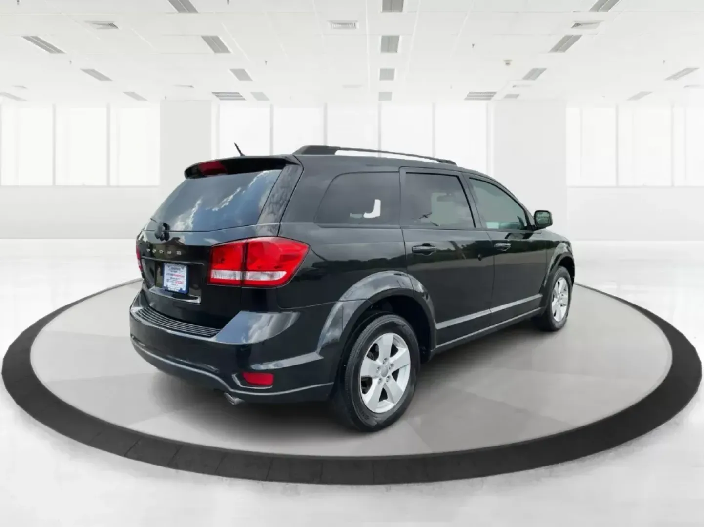 2012 Dodge Journey SXT (3C4PDCBG5CT) with an 2.4L I-4 DOHC engine, located at 401 Woodman Dr, Riverside, OH, 45431, (937) 908-9800, 39.760899, -84.123421 - 2012 Dodge Journey SXT - Photo#2