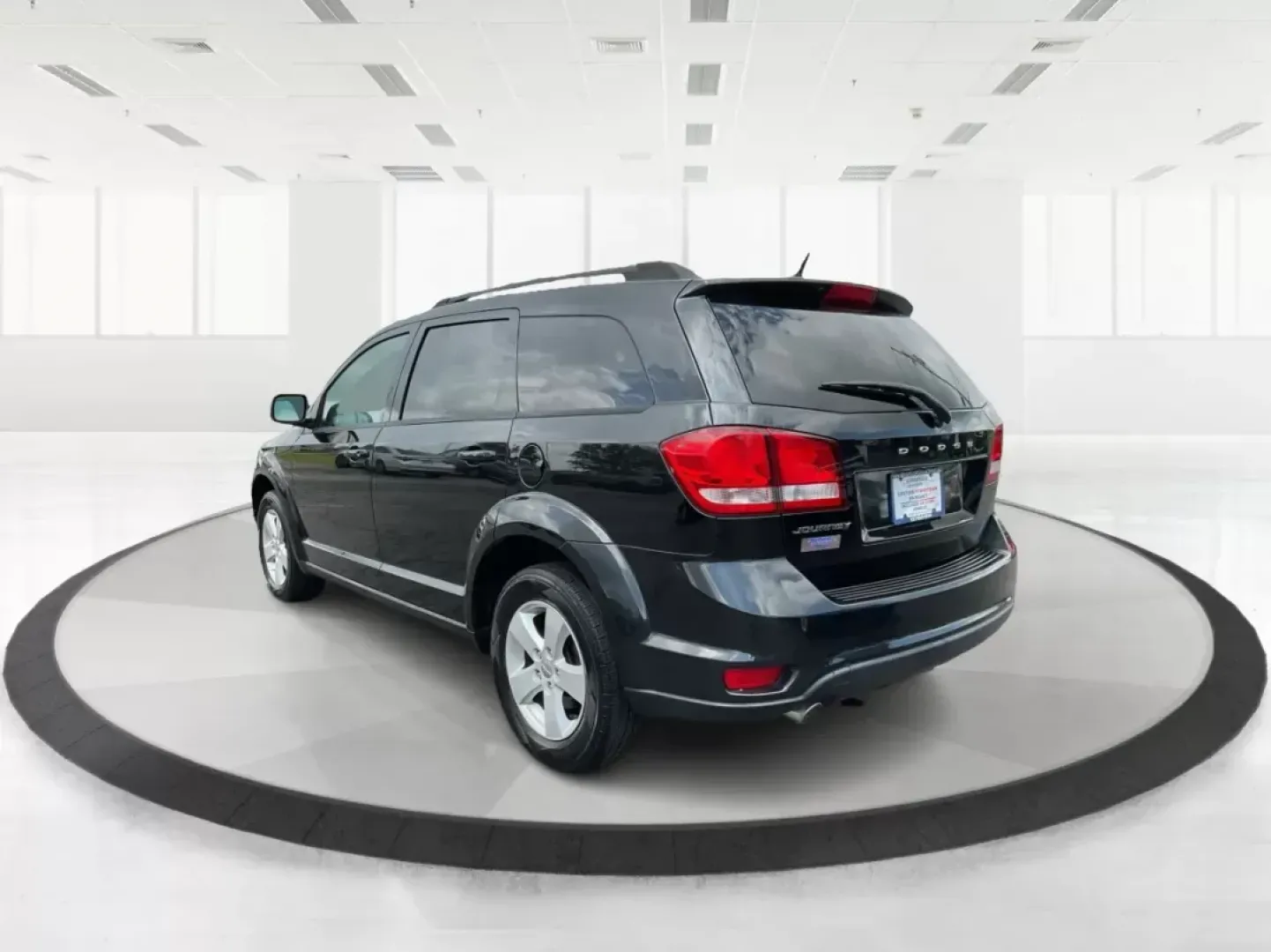 2012 Dodge Journey SXT (3C4PDCBG5CT) with an 2.4L I-4 DOHC engine, located at 401 Woodman Dr, Riverside, OH, 45431, (937) 908-9800, 39.760899, -84.123421 - 2012 Dodge Journey SXT - Photo#4