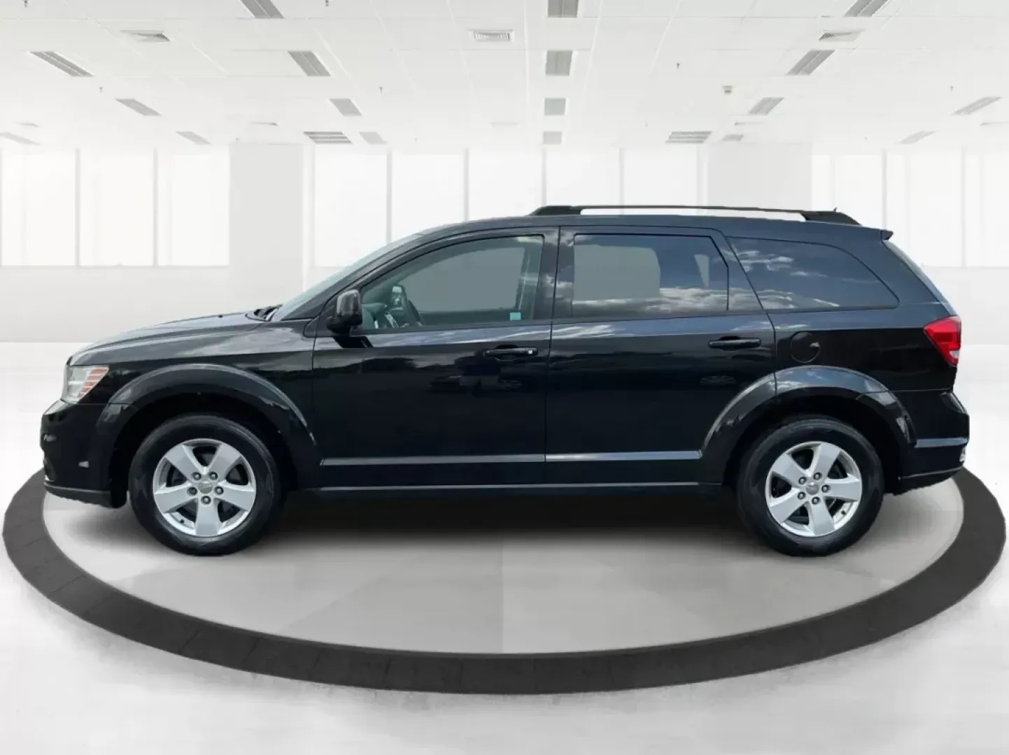 2012 Dodge Journey SXT (3C4PDCBG5CT) with an 2.4L I-4 DOHC engine, located at 401 Woodman Dr, Riverside, OH, 45431, (937) 908-9800, 39.760899, -84.123421 - 2012 Dodge Journey SXT - Photo#5