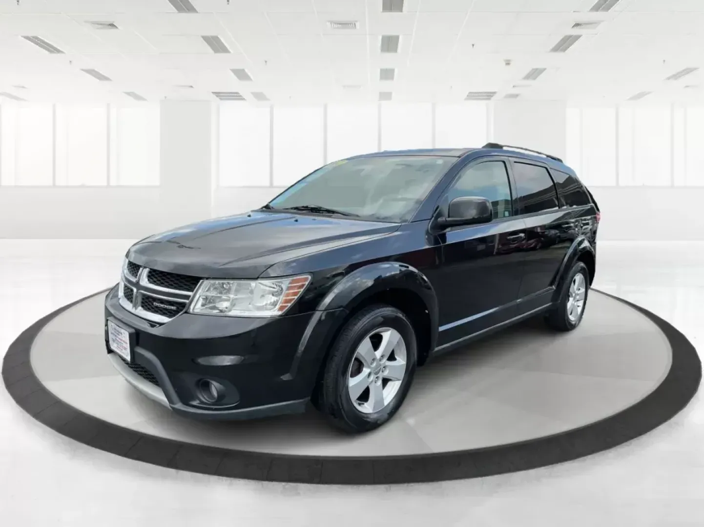 2012 Dodge Journey SXT (3C4PDCBG5CT) with an 2.4L I-4 DOHC engine, located at 401 Woodman Dr, Riverside, OH, 45431, (937) 908-9800, 39.760899, -84.123421 - 2012 Dodge Journey SXT - Photo#7