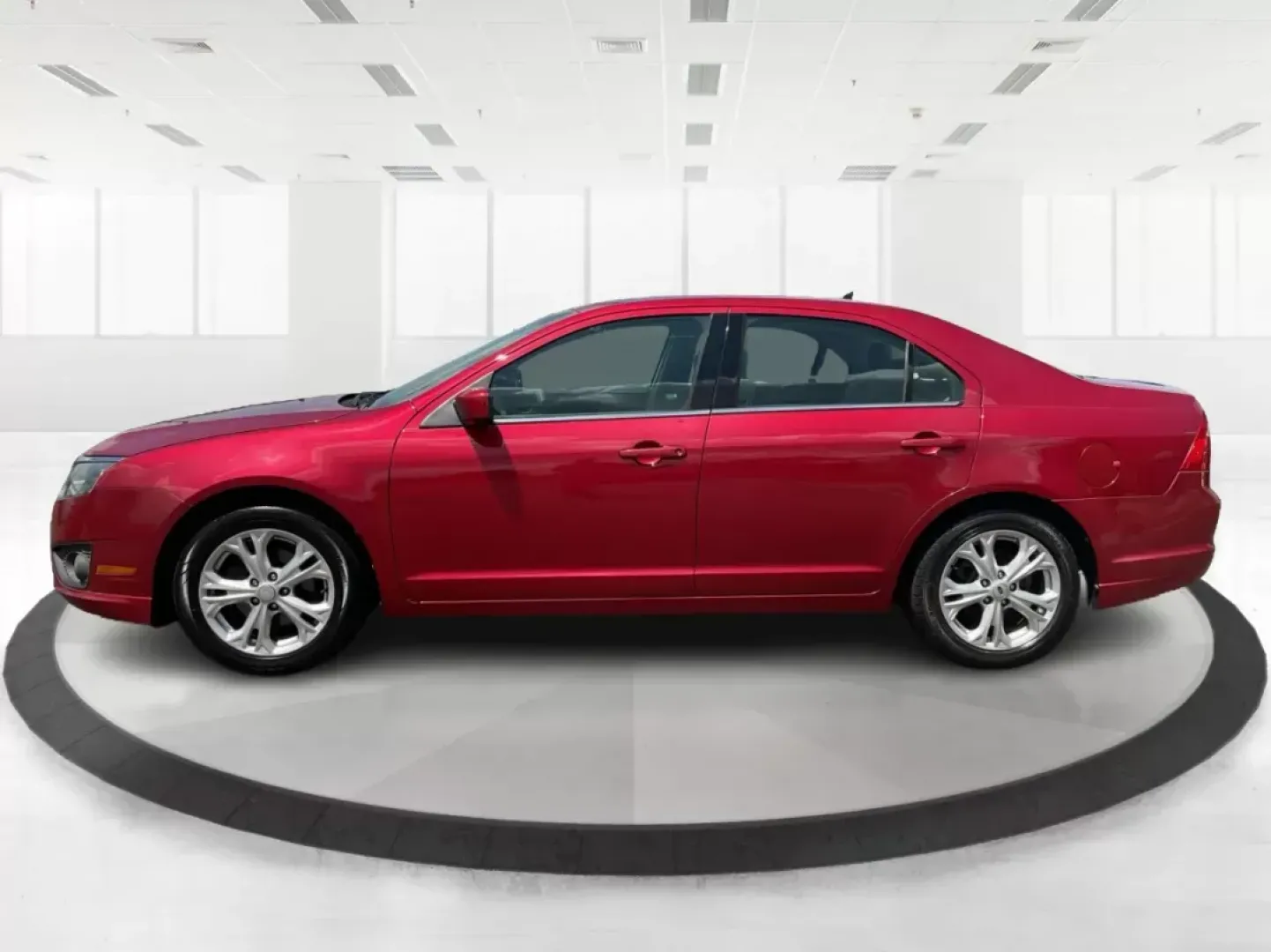 2012 Ford Fusion SE (3FAHP0HA2CR) with an 2.5L L4 DOHC 16V engine, located at 8750 N County Rd 25A, Piqua, OH, 45356, (937) 908-9800, 40.164391, -84.232513 - 2012 Ford Fusion SE - Photo#5