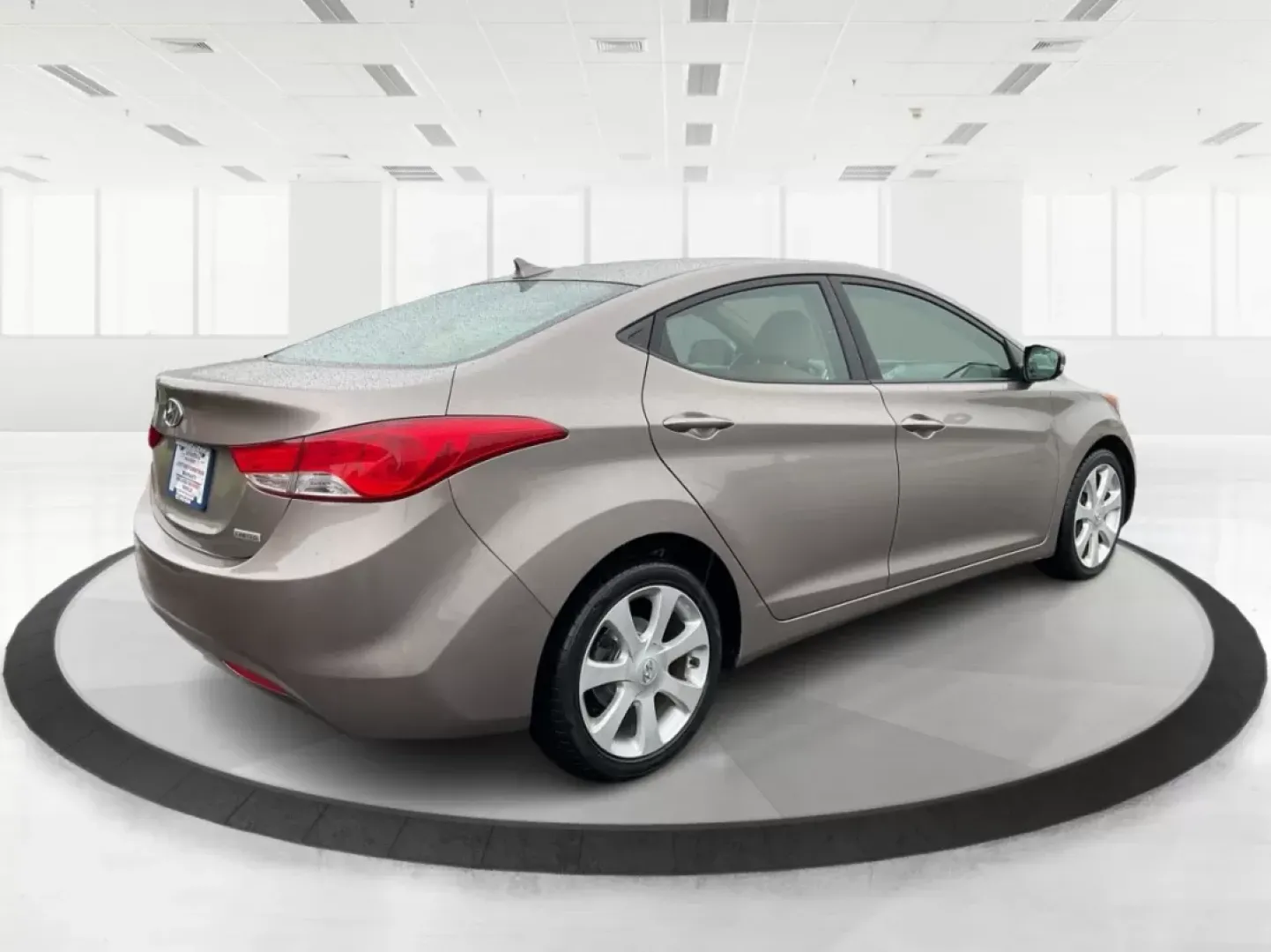 2012 Hyundai Elantra Limited (5NPDH4AE8CH) with an 1.8L I-4 DOHC engine, located at 401 Woodman Dr, Riverside, OH, 45431, (937) 908-9800, 39.760899, -84.123421 - 2012 Hyundai Elantra Limited - Photo#2