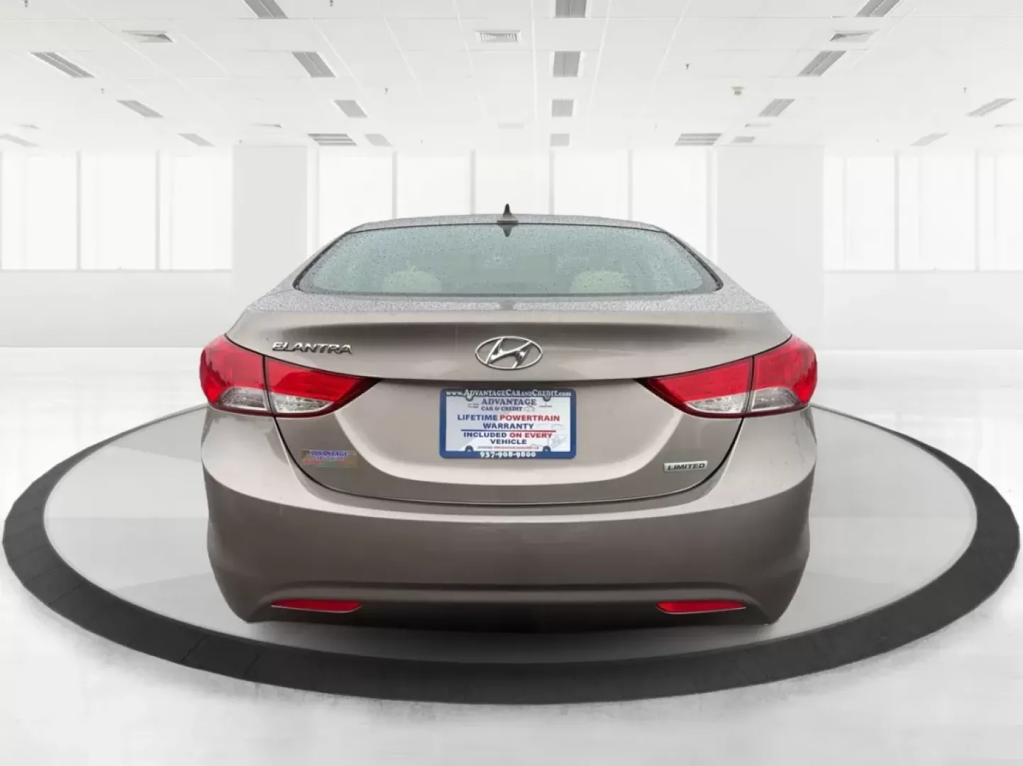 2012 Hyundai Elantra Limited (5NPDH4AE8CH) with an 1.8L I-4 DOHC engine, located at 401 Woodman Dr, Riverside, OH, 45431, (937) 908-9800, 39.760899, -84.123421 - 2012 Hyundai Elantra Limited - Photo#3