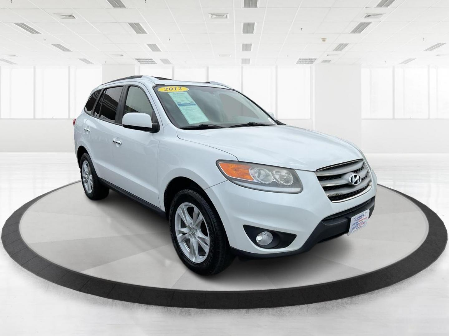 2012 Hyundai Santa Fe Limited V6 (5XYZKDAG5CG) with an 3.5L V-6 DOHC engine, located at 1230 East Main St, Xenia, OH, 45385, (937) 908-9800, 39.688026, -83.910172 - 2012 Hyundai Santa Fe Limited V6 - Photo#0