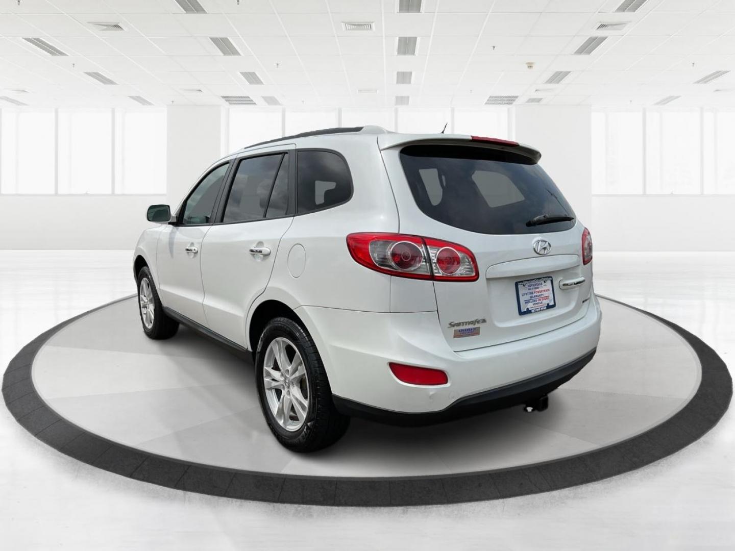 2012 Hyundai Santa Fe Limited V6 (5XYZKDAG5CG) with an 3.5L V-6 DOHC engine, located at 1230 East Main St, Xenia, OH, 45385, (937) 908-9800, 39.688026, -83.910172 - 2012 Hyundai Santa Fe Limited V6 - Photo#5