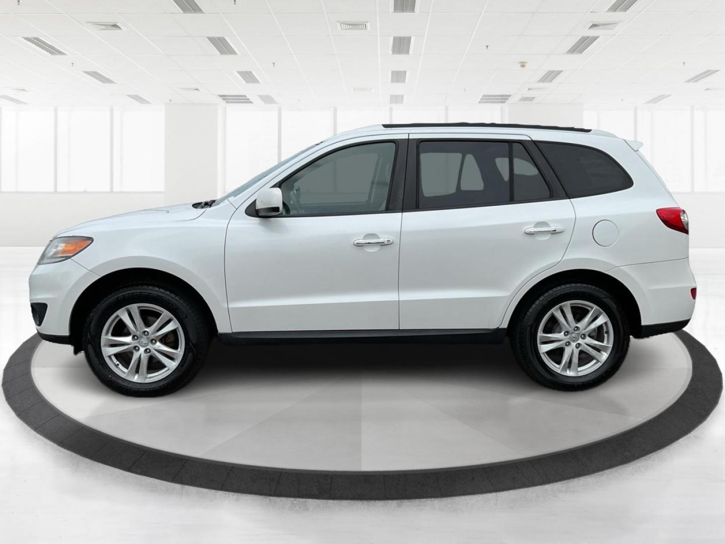 2012 Hyundai Santa Fe Limited V6 (5XYZKDAG5CG) with an 3.5L V-6 DOHC engine, located at 1230 East Main St, Xenia, OH, 45385, (937) 908-9800, 39.688026, -83.910172 - 2012 Hyundai Santa Fe Limited V6 - Photo#6