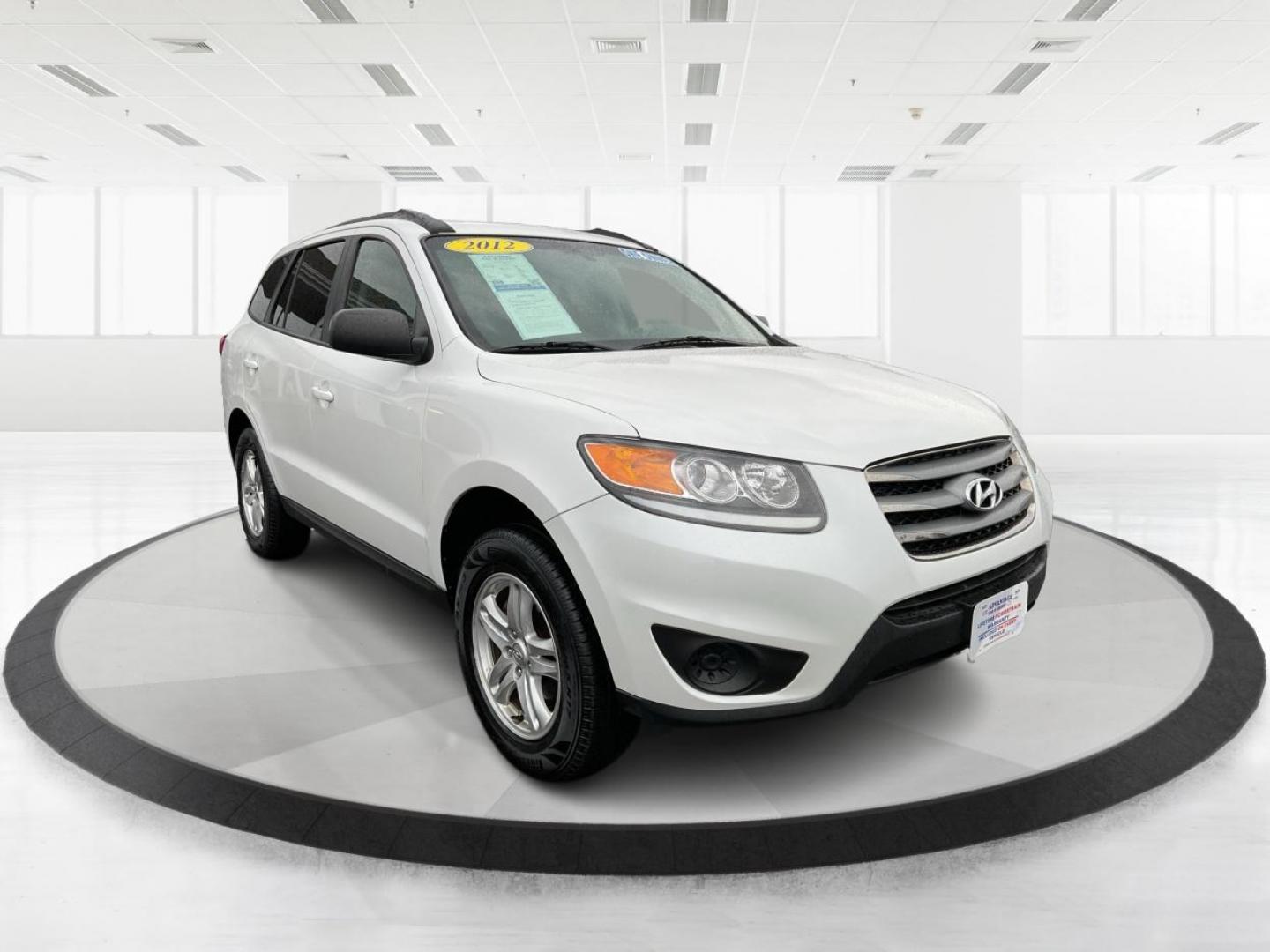 2012 Hyundai Santa Fe GLS (5XYZGDAB5CG) with an 2.4L I-4 DOHC engine, located at 1099 N County Rd 25A, Troy, OH, 45373, (937) 908-9800, 40.057079, -84.212883 - One Owner - Photo#0