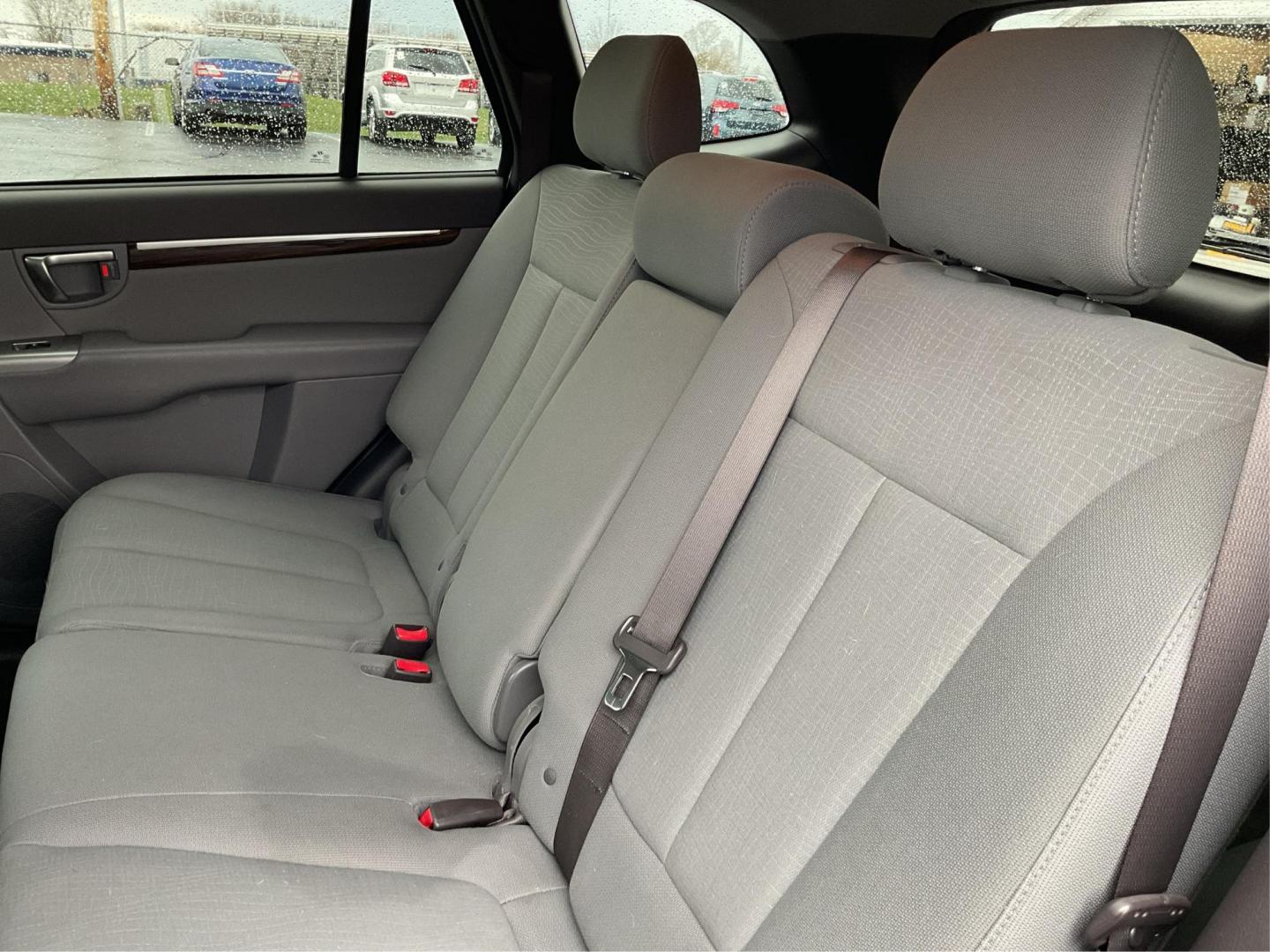 2012 Hyundai Santa Fe GLS (5XYZGDAB5CG) with an 2.4L I-4 DOHC engine, located at 1099 N County Rd 25A, Troy, OH, 45373, (937) 908-9800, 40.057079, -84.212883 - One Owner - Photo#9