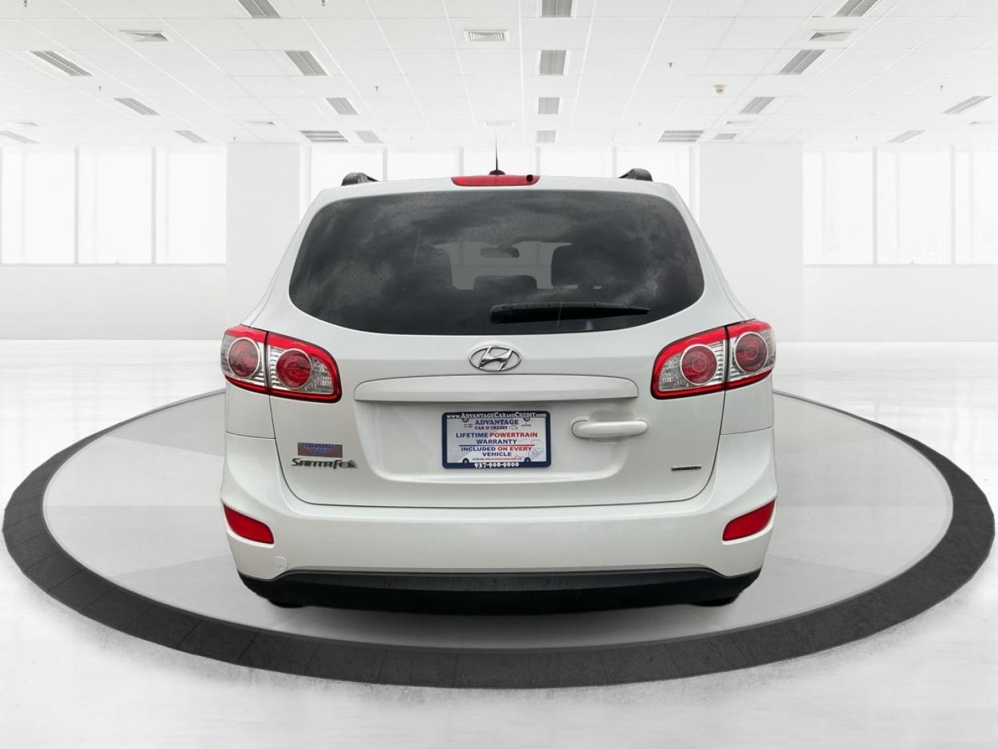 2012 Hyundai Santa Fe GLS (5XYZGDAB5CG) with an 2.4L I-4 DOHC engine, located at 1099 N County Rd 25A, Troy, OH, 45373, (937) 908-9800, 40.057079, -84.212883 - One Owner - Photo#3