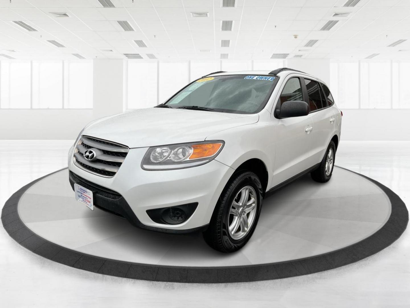 2012 Hyundai Santa Fe GLS (5XYZGDAB5CG) with an 2.4L I-4 DOHC engine, located at 1099 N County Rd 25A, Troy, OH, 45373, (937) 908-9800, 40.057079, -84.212883 - One Owner - Photo#7