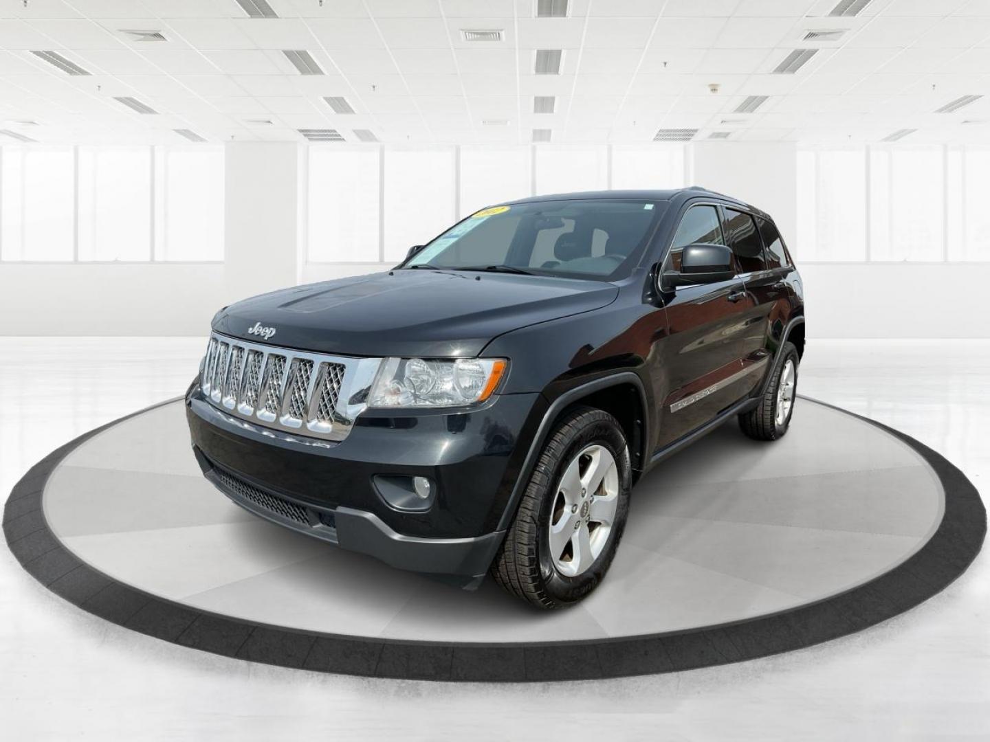 2012 Jeep Grand Cherokee Laredo (1C4RJFAG3CC) with an Other engine, located at 880 E. National Road, Vandalia, OH, 45377, (937) 908-9800, 39.891918, -84.183594 - 2012 Jeep Grand Cherokee Laredo - Photo#7